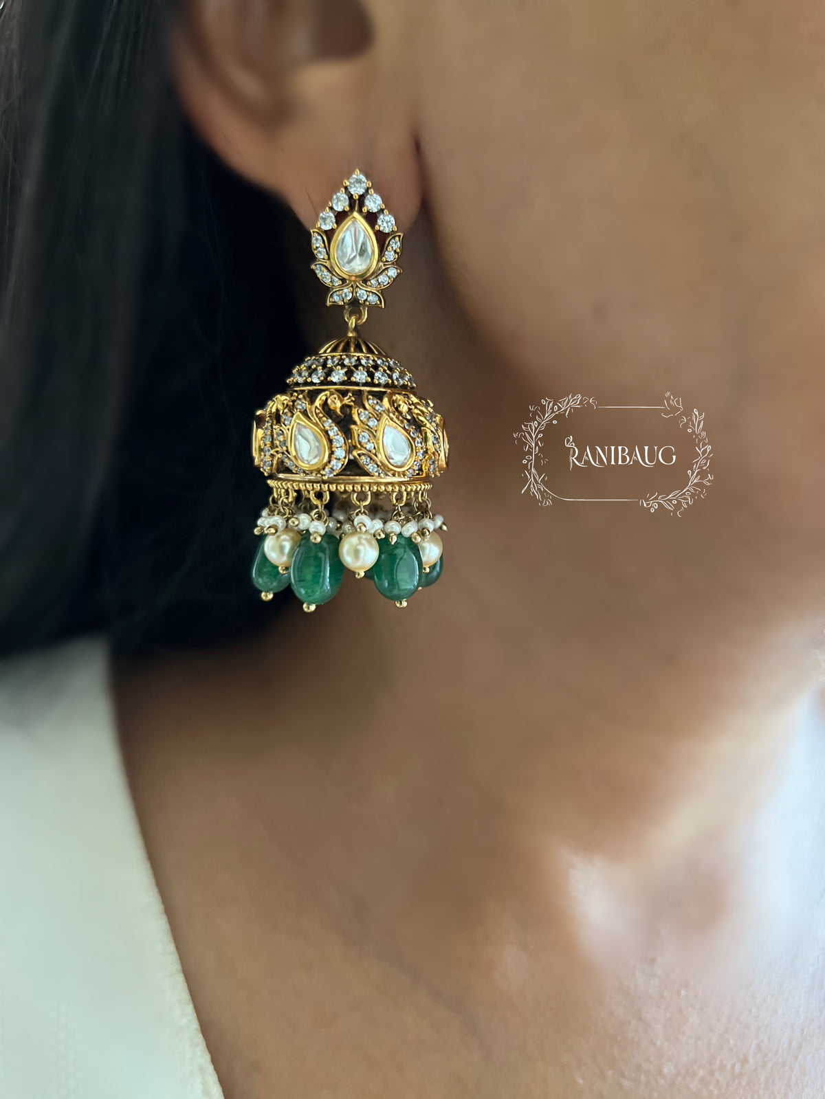 Anisha Polki Gold Finish Peacock Motif Festive Jhumka By Ranibaug