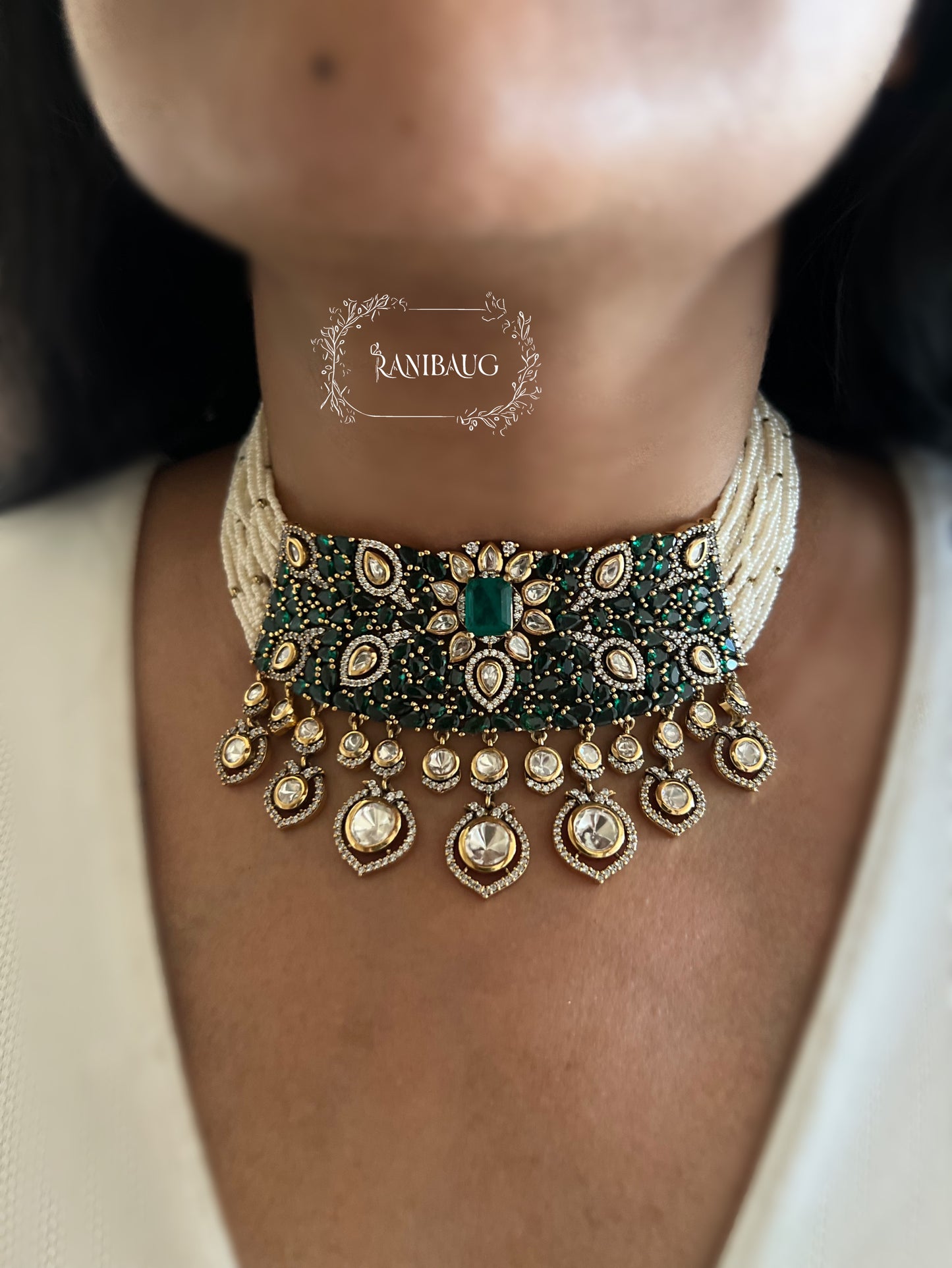 Anishi Emerald Ruby Stones Pearl Strand Mossaiite Polki Drops Choker Set By Ranibaug