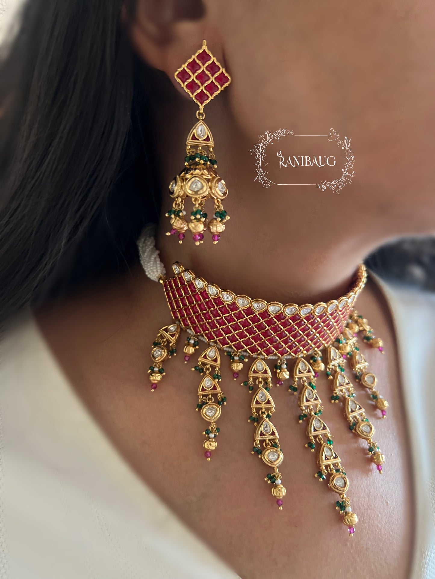 Anmol Red Chocker Necklace Set In Rich Gold Accent And Golden Danglers By Ranibaug | Statement Jewelry Pieces Royal Jewellery 2025 2026