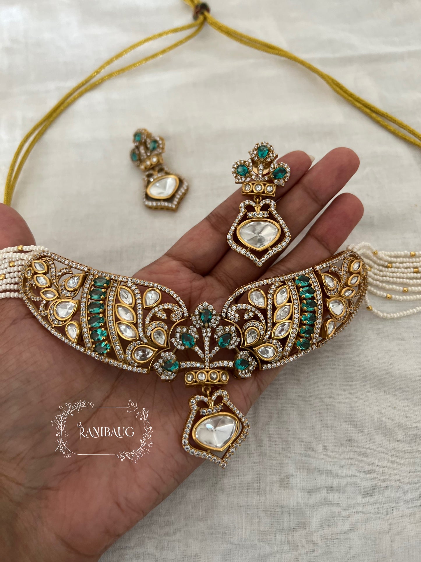 Anya Emerald And Pink Intricate Designer Royal Gold Finish Statement Jewellery Set By Ranibaug | The Wedding Collection 2026
