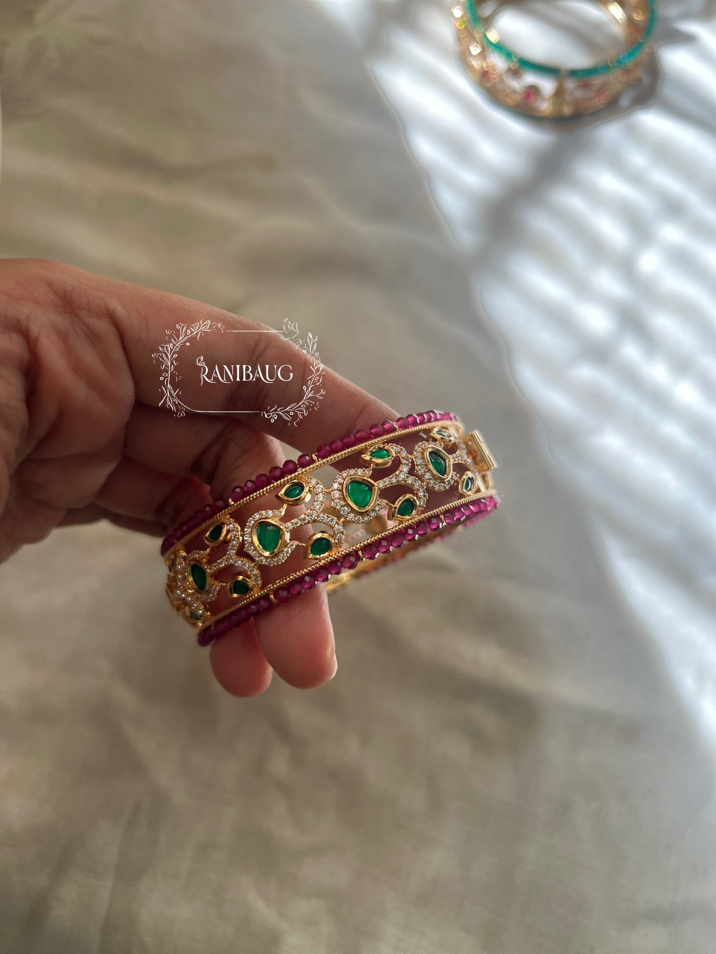 Arna Gold Plated Pink And Green Bangle For Lehenga By Ranibaug