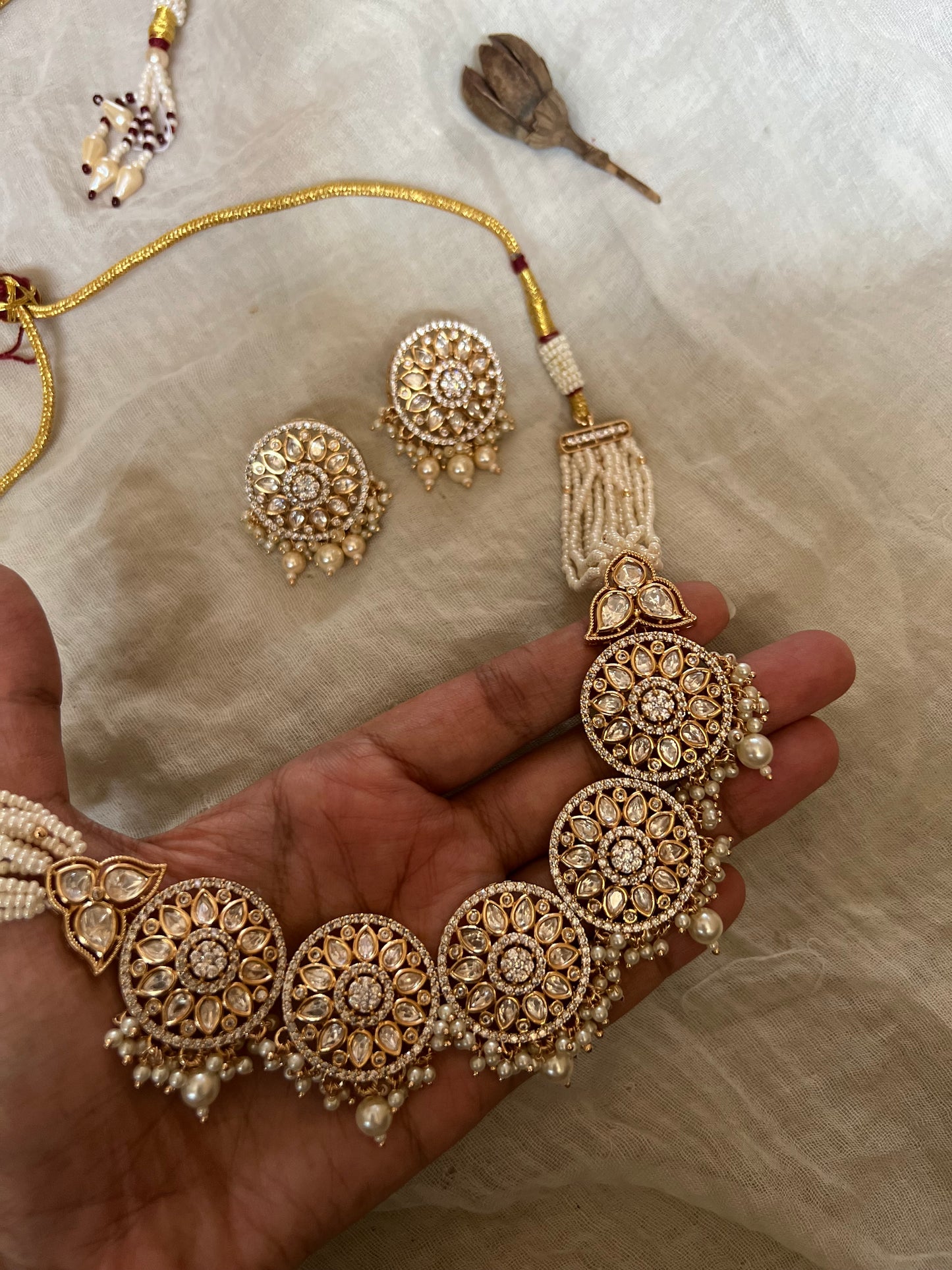 Ekta Gold Plated Mossainite Stones Set In Rich Pearl Bead Tassels Necklace Jewellery Set By Ranibaug