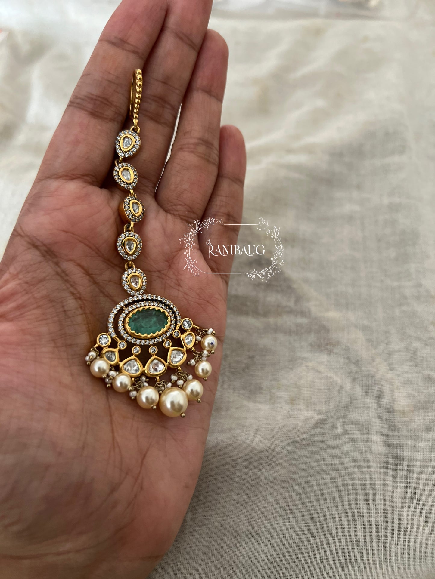 Gautami Rich Gold Tone Polki Studded Green Maangtikka With Pearl By Ranibaug