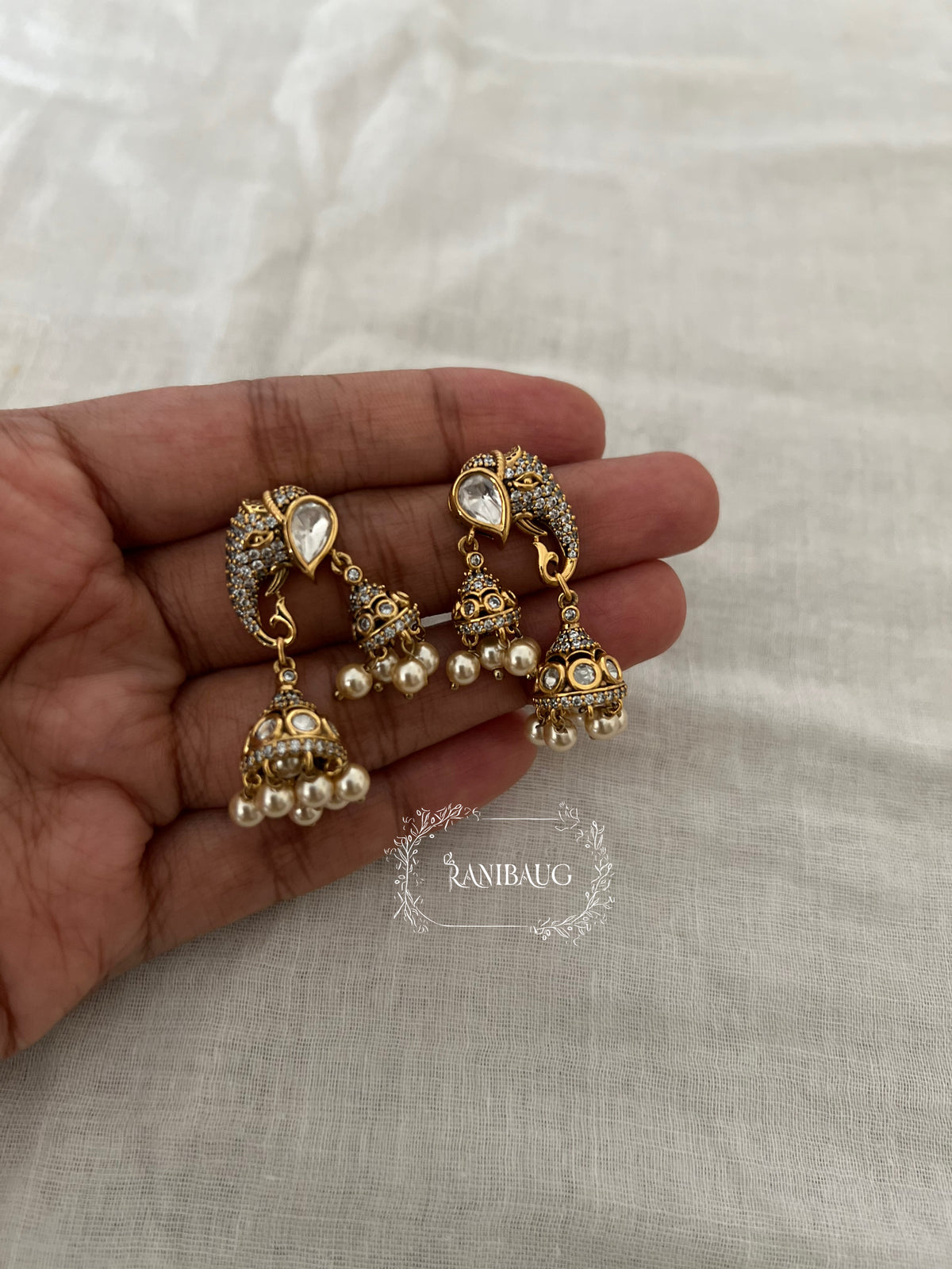 Kanika Designer Jhumki Adorned Gold Finish Festive Ear Studs By Ranibaug