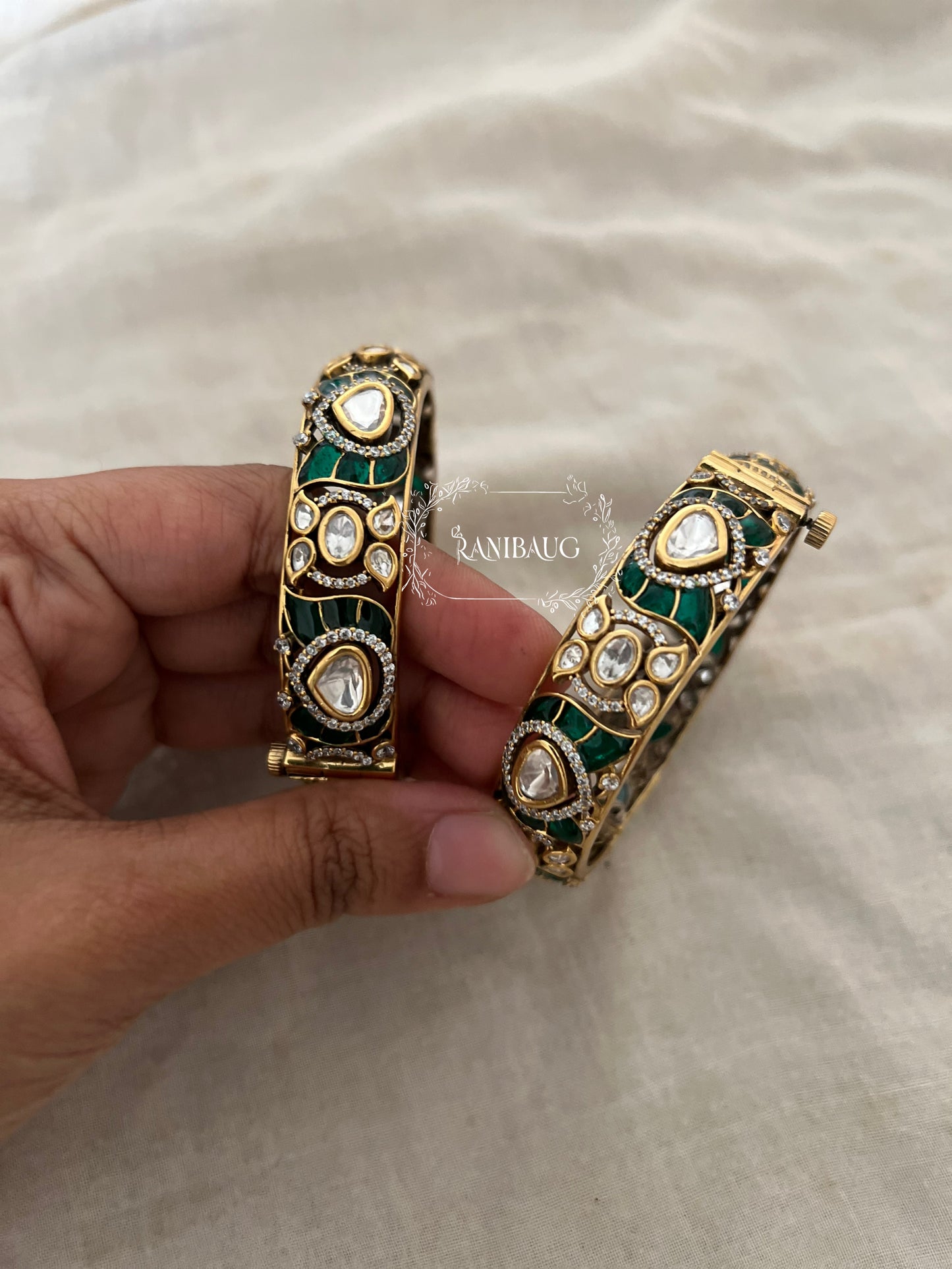 Manasvi Emerald Green Kundan Motif Gold Plated Bangles Set By Ranibaug