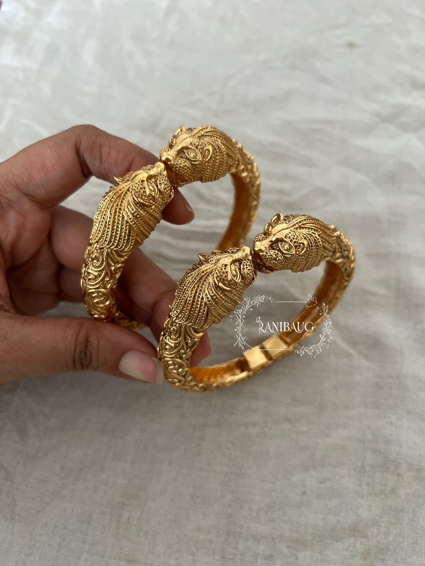 Mansi Lion Kada Bangles In Premium Gold Finish By Ranibaug
