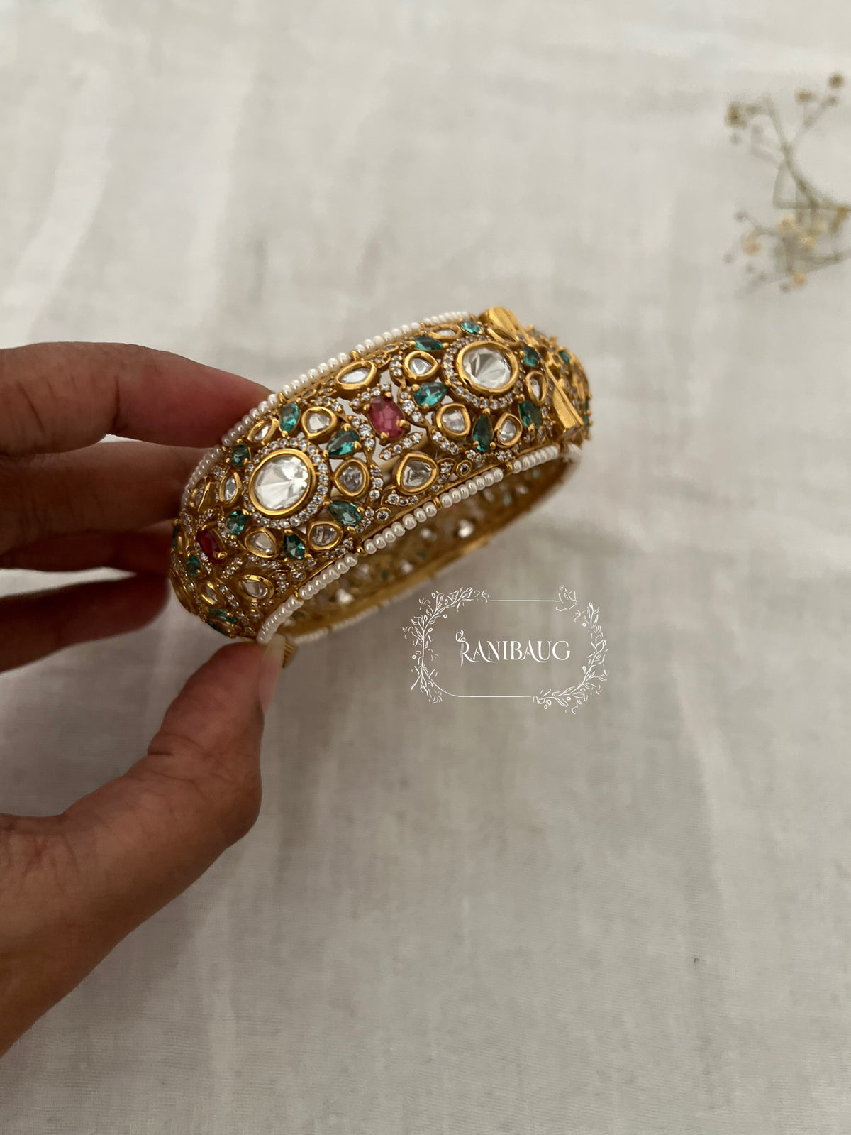 Miraya Royal Mint Pink Seed Pearl Kundan Gold Finish Bangle By Ranibaug