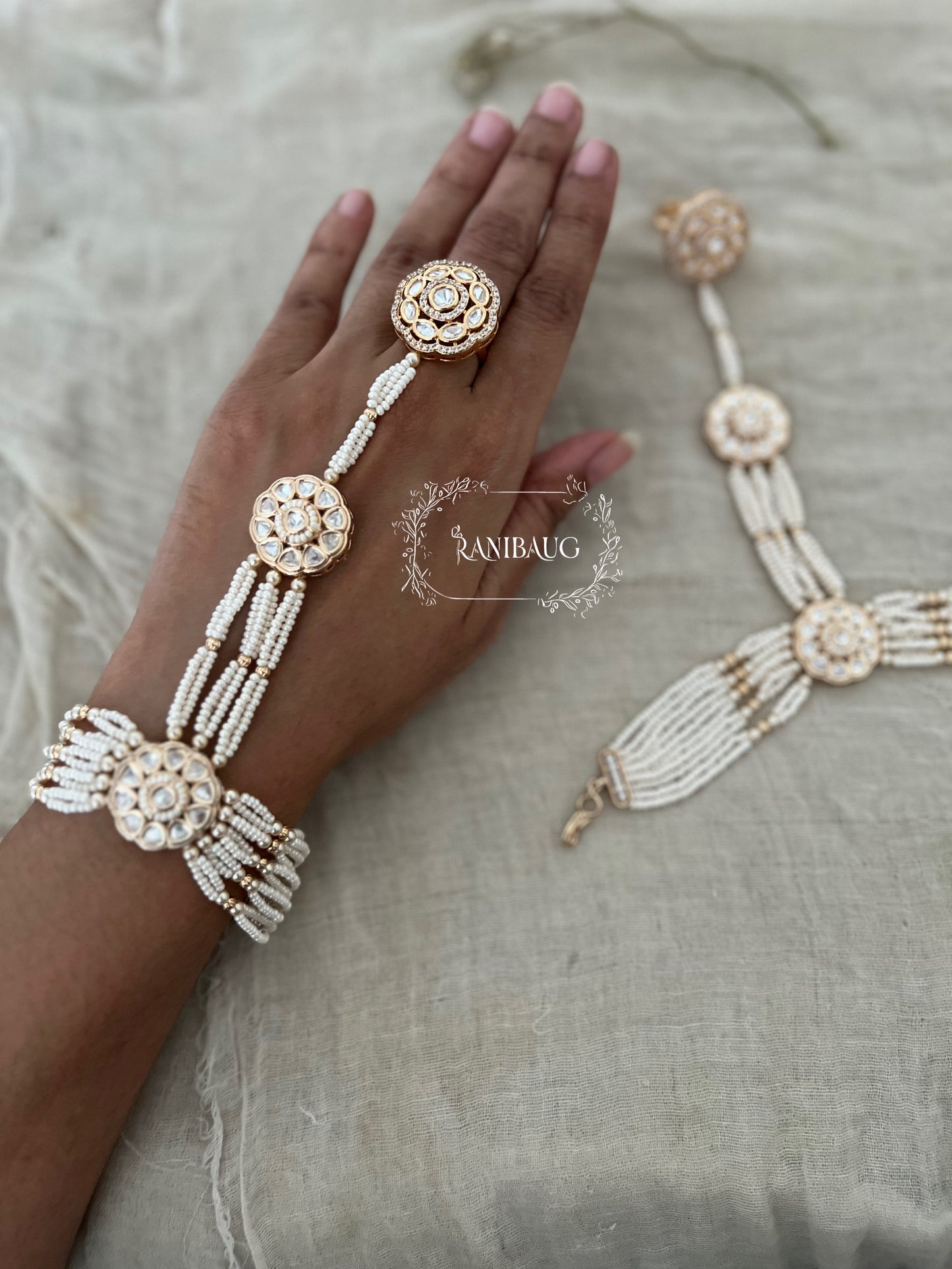 Mishita Pearl White And Gold Hathphool Bracelet | Ranibaug