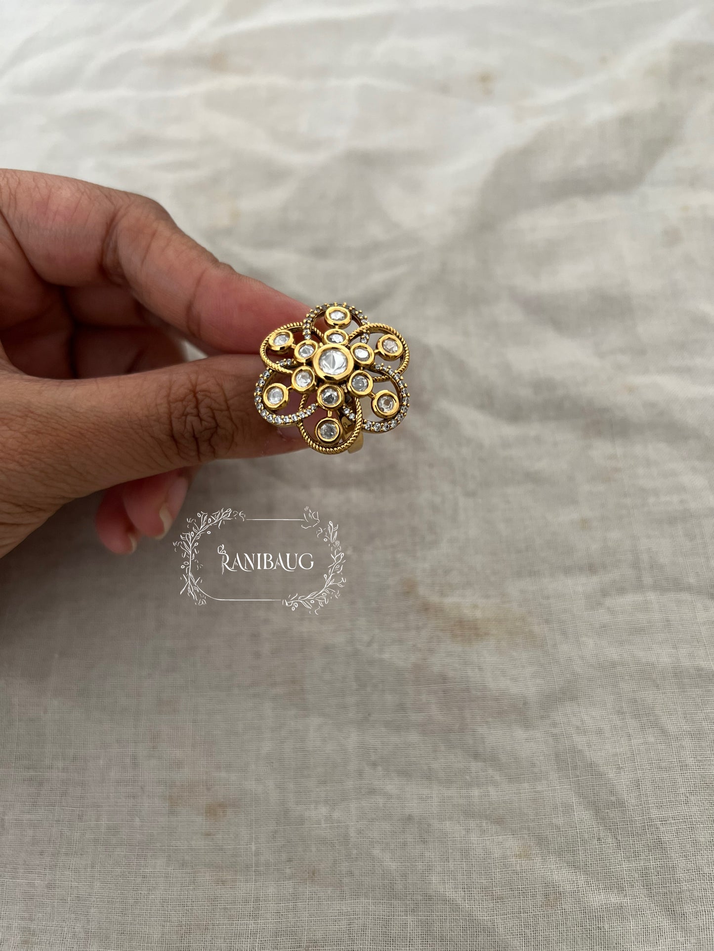 Niharika Universe Floral Bloom Ring In Premium Gold Tone Studded With Polki Kundan Stones By Ranibaug