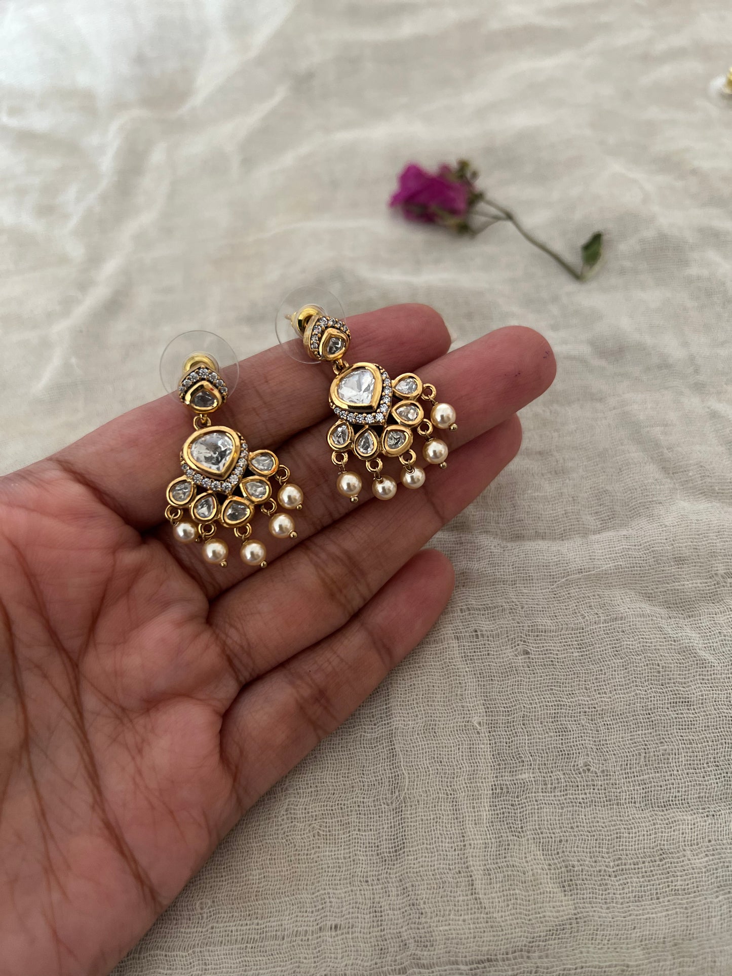 Nikhar Royal Mossainite Stone Polki Studded Luxury Gold Finish Stud Earrings By Ranibaug