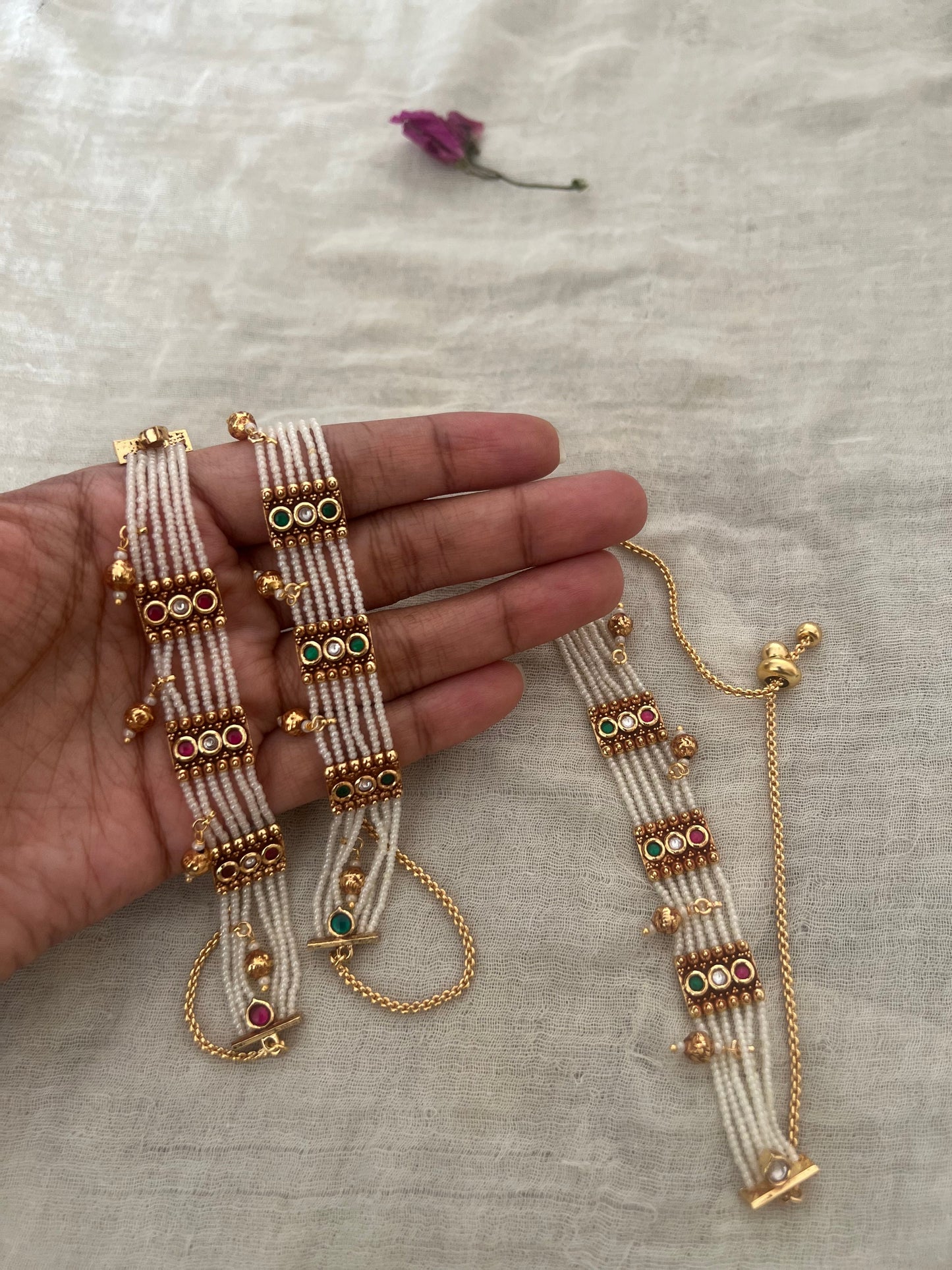 Padmini Pearl Strand Gold Finish Beaded Dangle Bracelet By Ranibaug