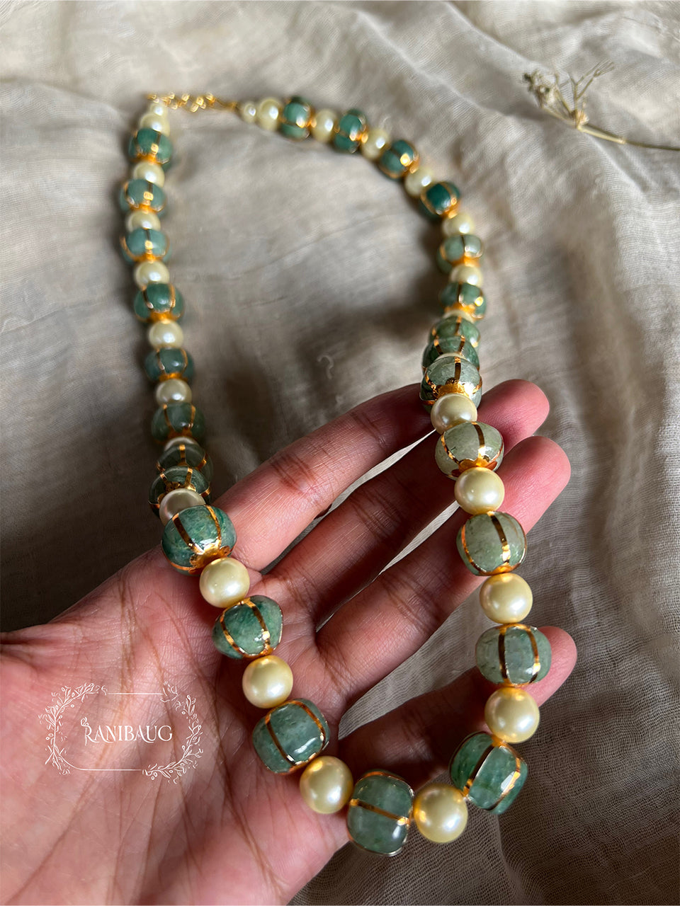 Priya Bead Necklace With Creamy Pearls And Emerald Crystals By Ranibaug