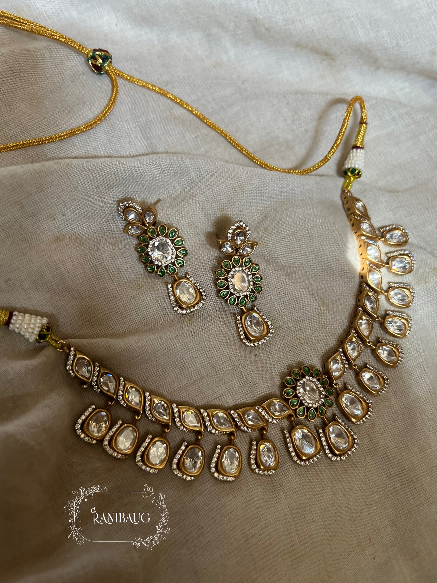 Ritisha Floral Motif Mossainite Polki Studded Lavish Gold Finish Choker Jewellery Set By Ranibaug