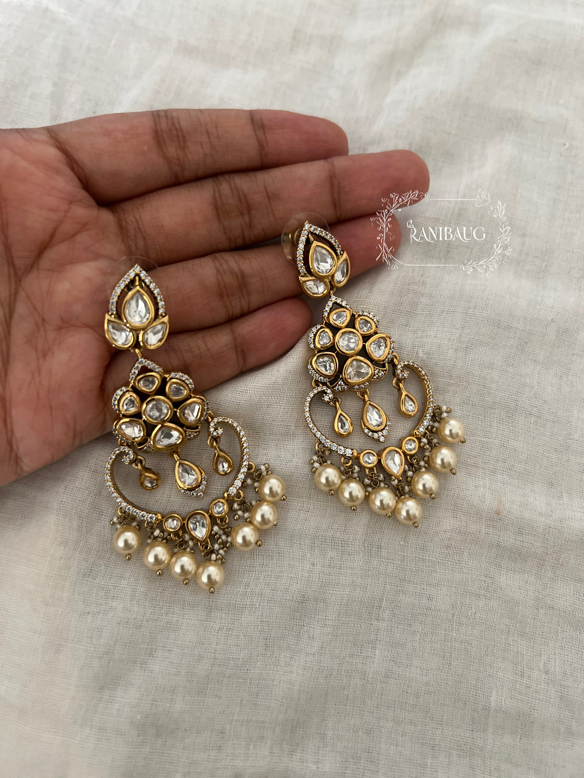 Sakshi Simple Kundan Pearl Gold Finish Festive Pearl Adorned Chandbali By Ranibaug