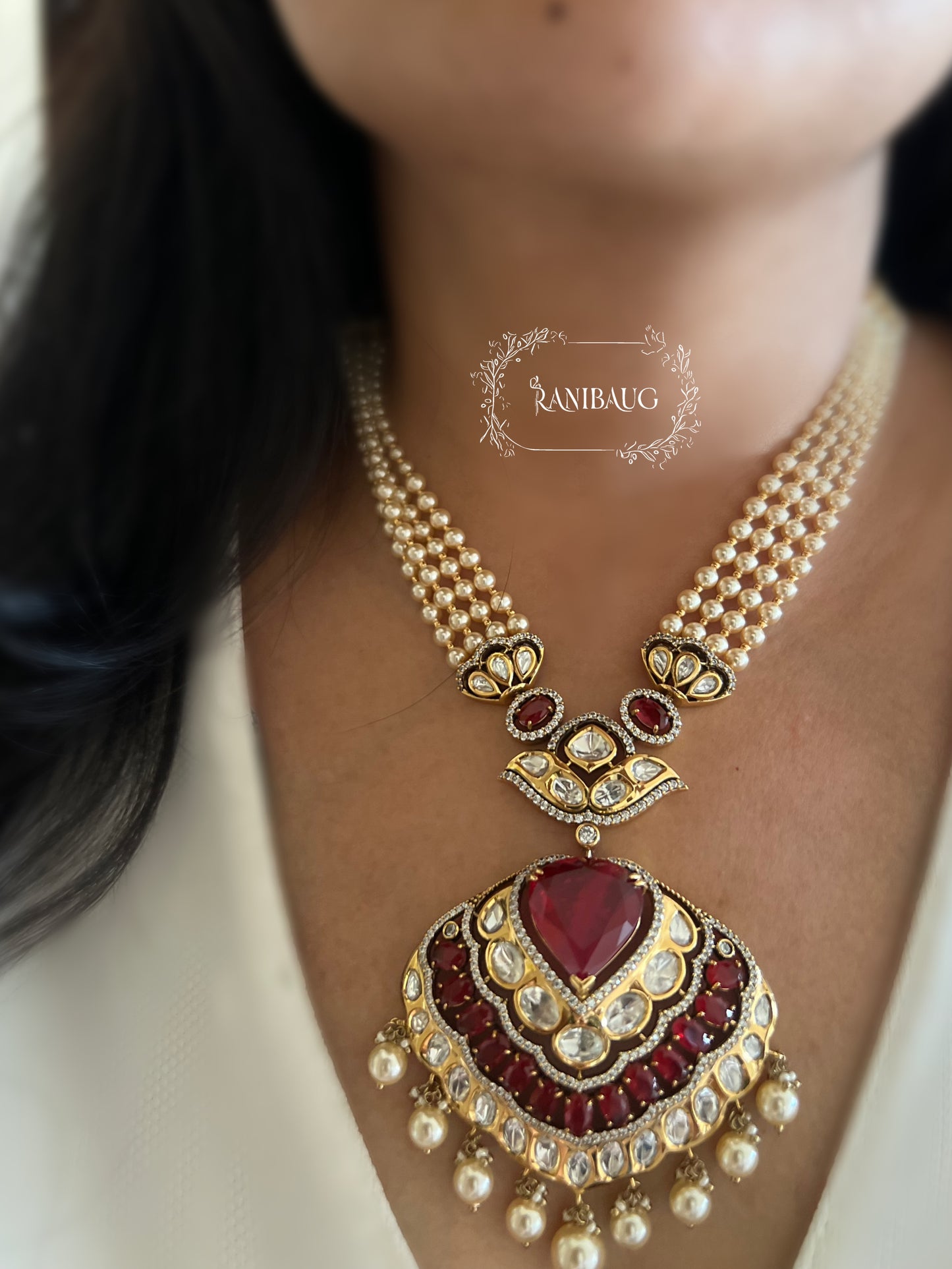 Sangharshi Queen's Heart Deep Red Ruby Adorned Polki Pearl Gold Finish Necklace Set By Ranibaug
