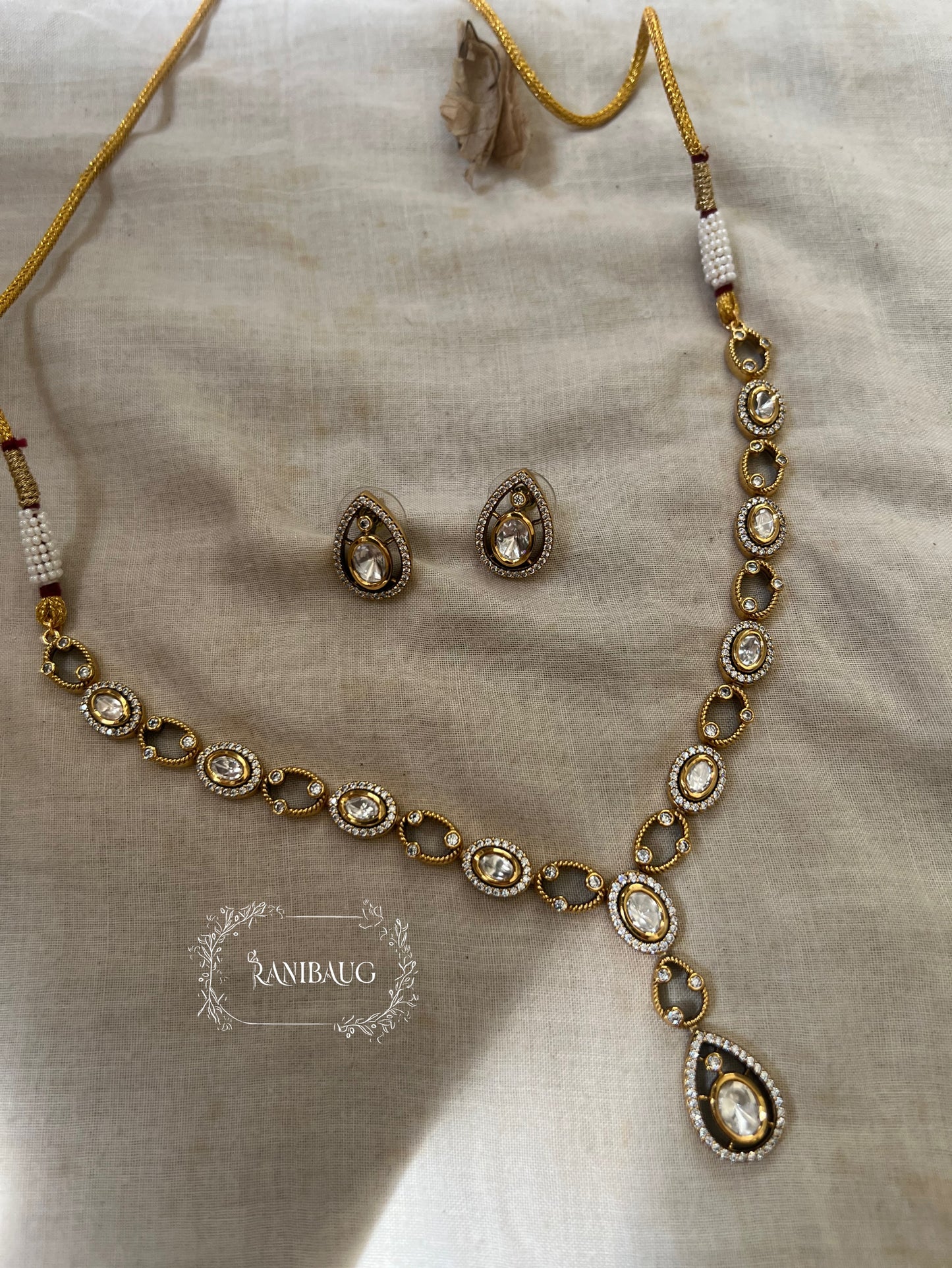 Sasha Gold Finish Teardrop Motif Polki Kundan Necklace Set By Ranibaug | 2025 2026