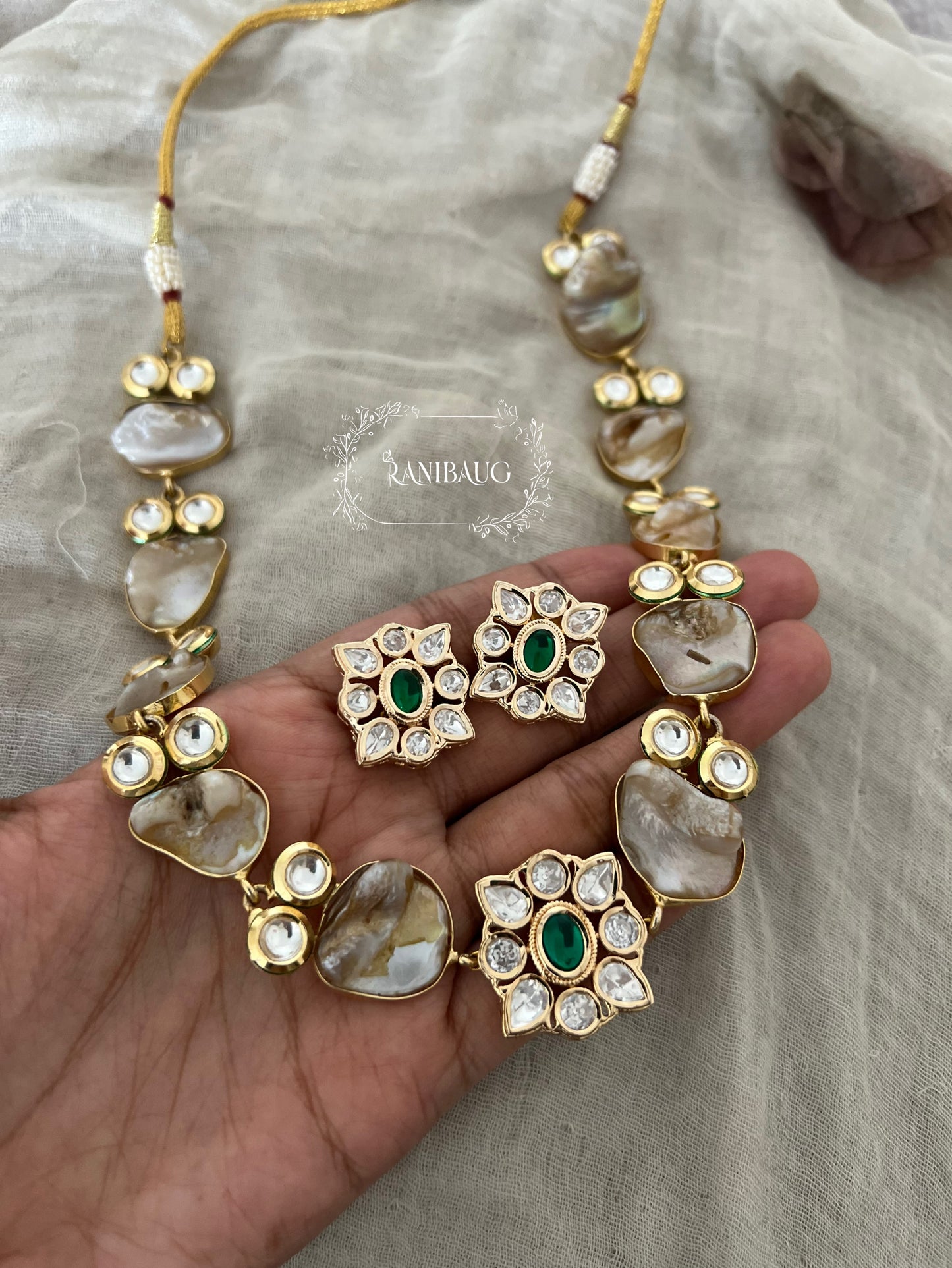 Soma Gold Plated Kundan Studded Semi Precious Necklace Set Featuring Real Baroque Pearl Motifs By Ranibaug