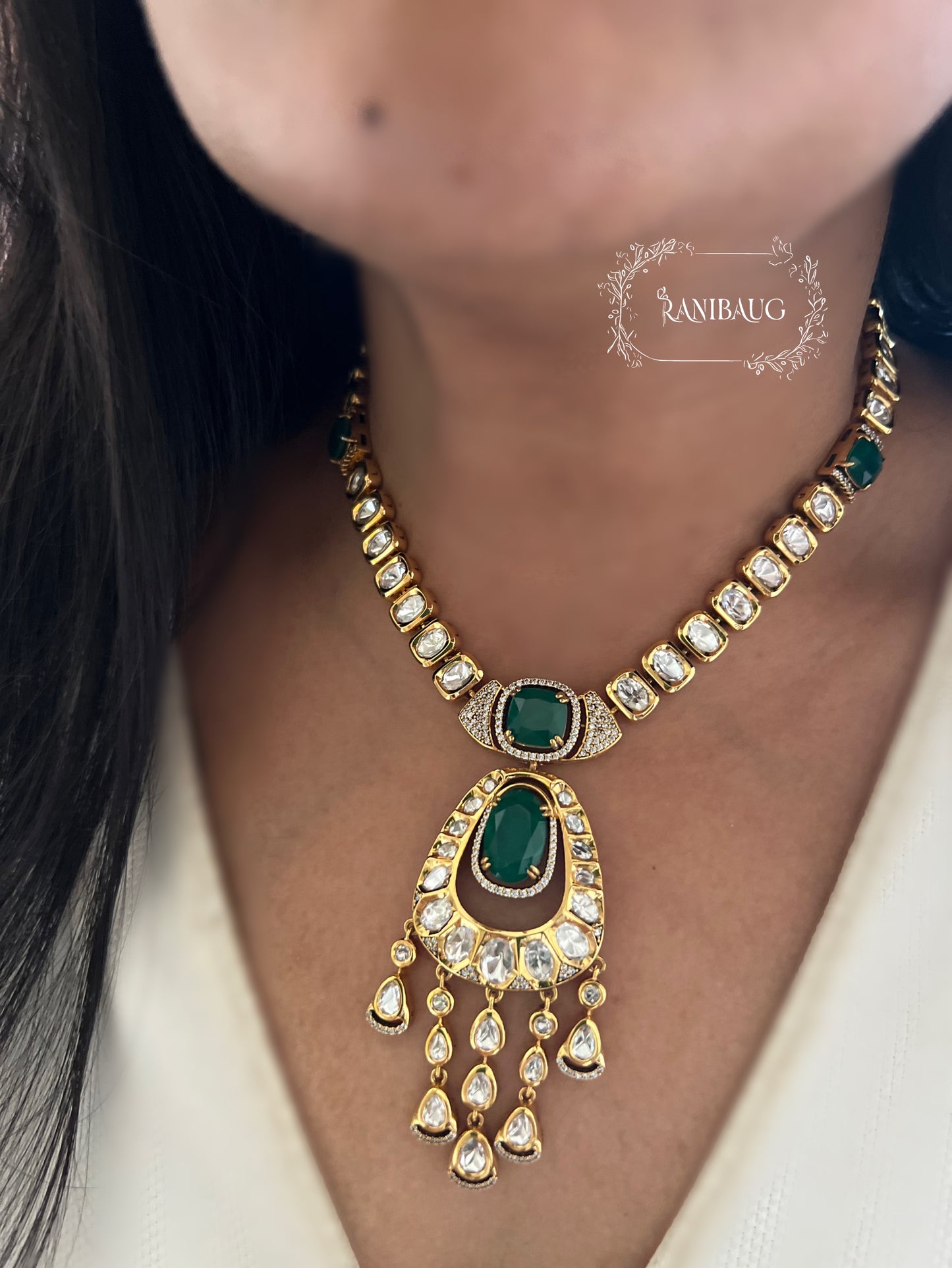 Suman Emerald Green Gemstone Teardrop Motif In Kundan Studs And Premium Gold Finish Necklace Jewellery Set By Ranibaug