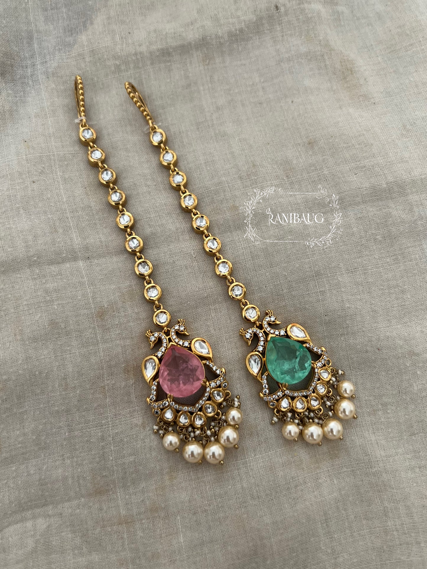Vishaka Gold Plated Kundan Studded Peacock Motif Maang Tikka With Pearl Clusters By Ranibaug | Fancy Maang Tikka Jewelry For Wedding