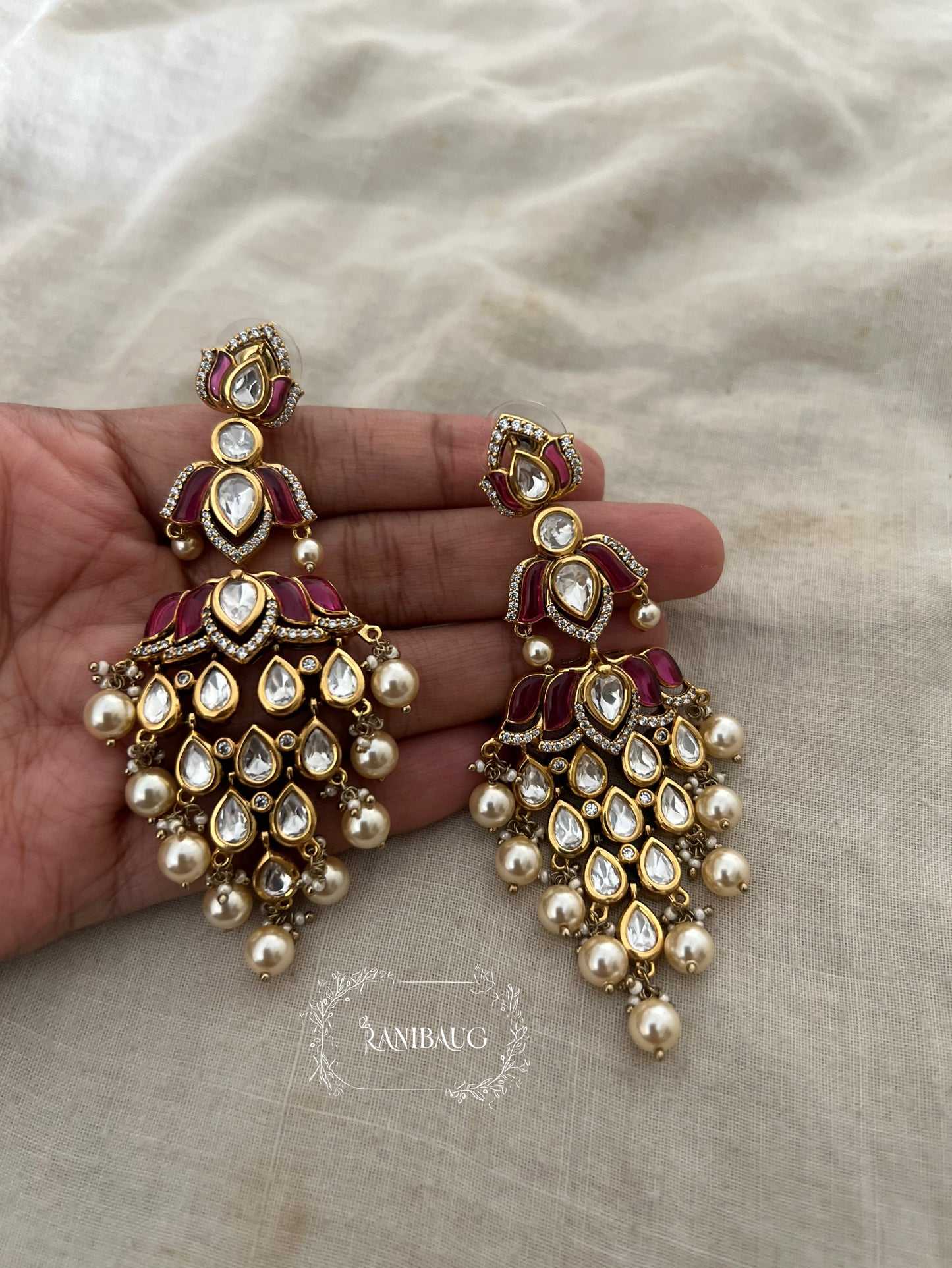 Tanishqa Lotus Shaped Gemstone Polki Danglers Festive Earrings By Ranibaug | 2026