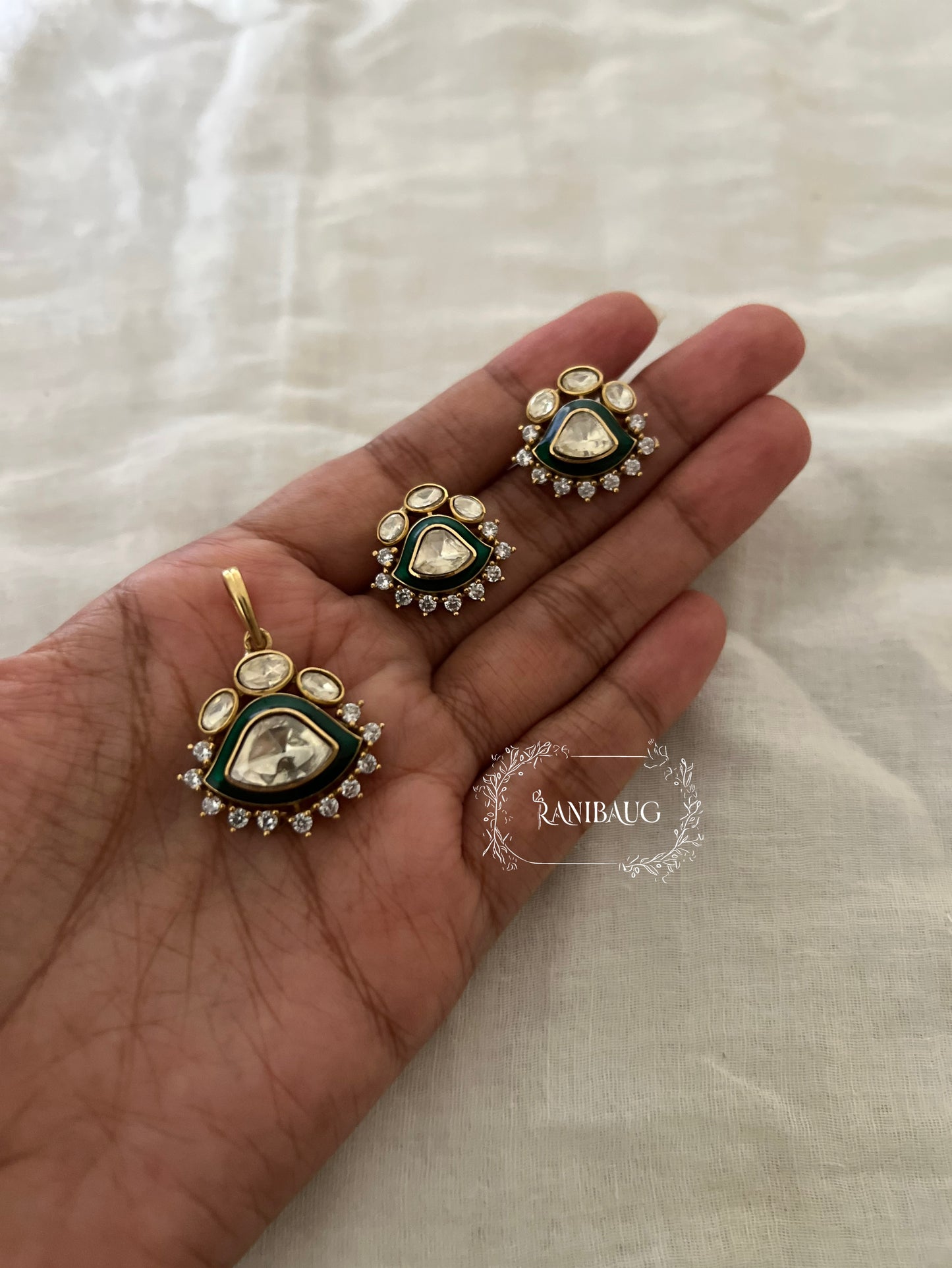 Indraja Red And Green Gold Plated Polki Kundan Pendant Set By Ranibaug | A Designer Jewelry Piece