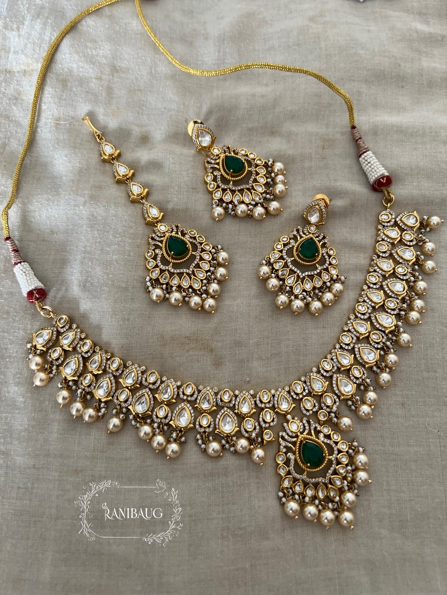 Aira Modern Traditional Minimal Mossainite Polki Adorned Necklace In Teardrop Motifs In Rich Gold Finish By Ranibaug