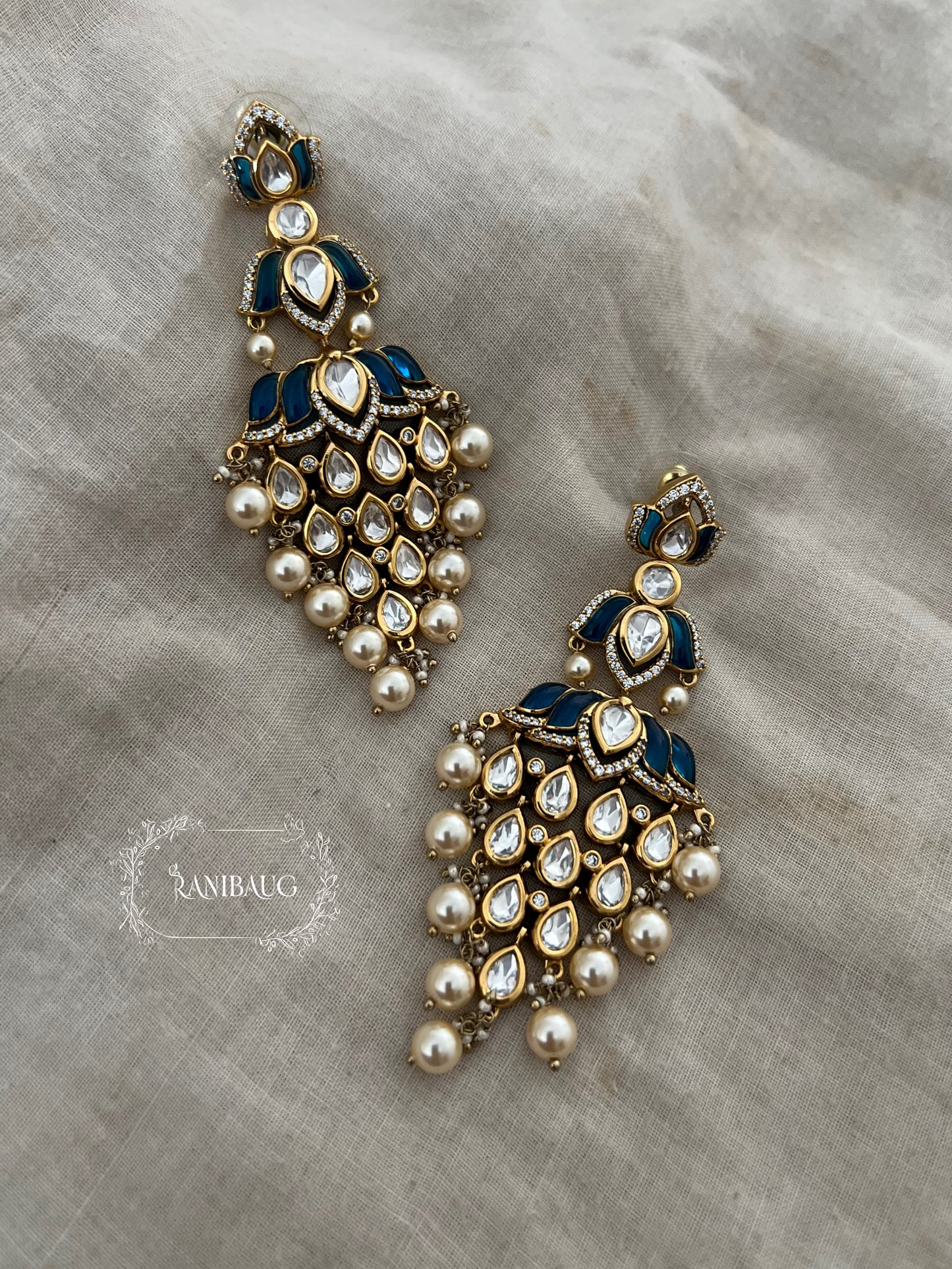 Tanishqa Lotus Shaped Gemstone Polki Danglers Festive Earrings By Ranibaug | 2026