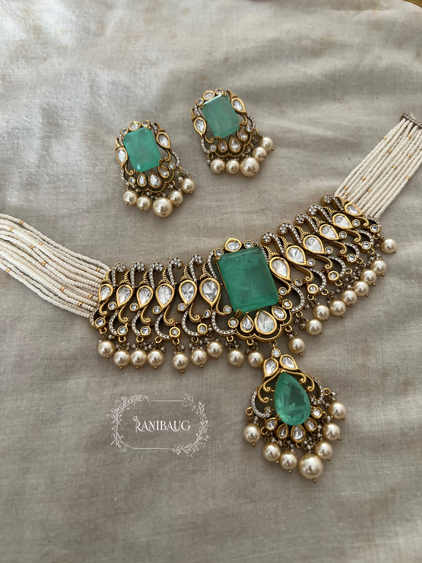 Trishna Emerald Stone And Polki Kundan Accents Multistrand Necklace Set For Women By Ranibaug For Special Occasions