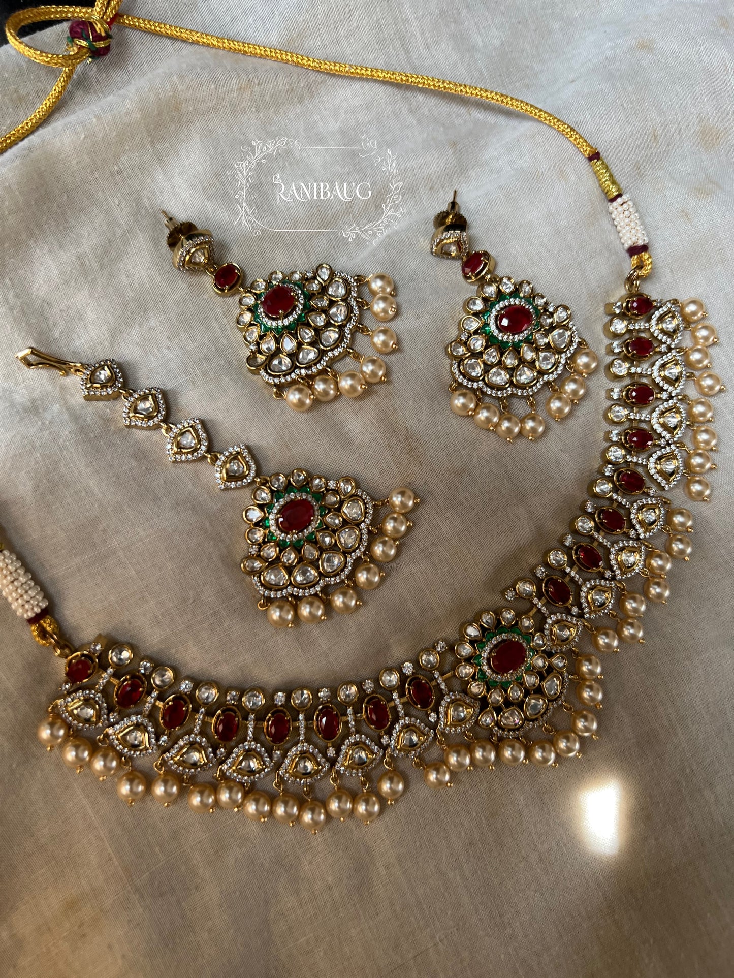 Kumud Light Green Teardrop Center Motif Two Layered Kundan Studded Gold Finish Premium Festive Necklace Set By Ranibaug