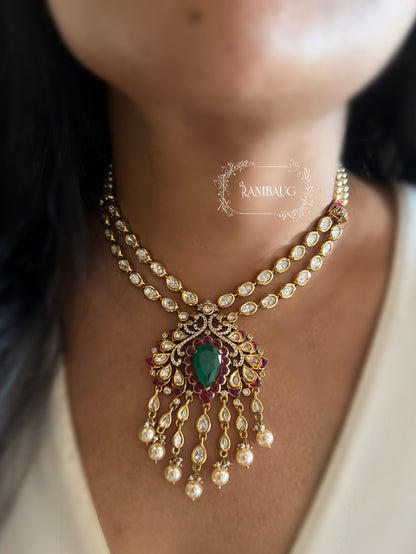 Zarika Geometric Polki Studded Gold Finish Emerald Stones Adorned Two Layered Necklace Set By Ranibaug