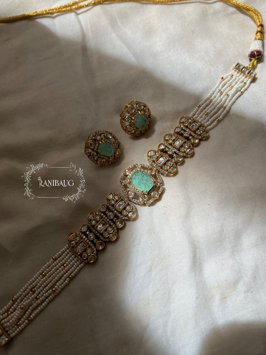 Nishi Royal Polki Kundan Studded Gold Finish Layered Necklace Set With Earrings By Ranibaug