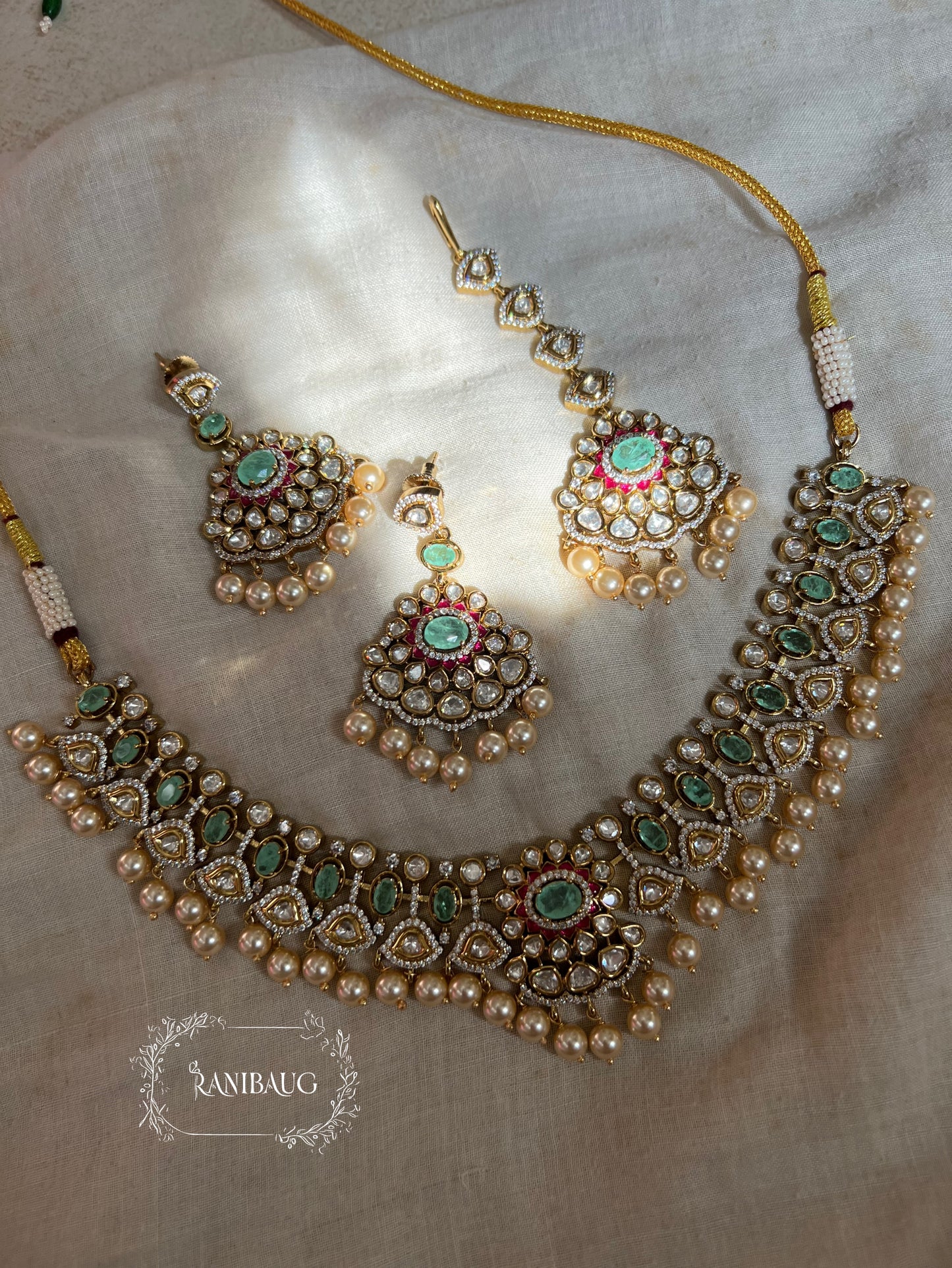 Kumud Light Green Teardrop Center Motif Two Layered Kundan Studded Gold Finish Premium Festive Necklace Set By Ranibaug
