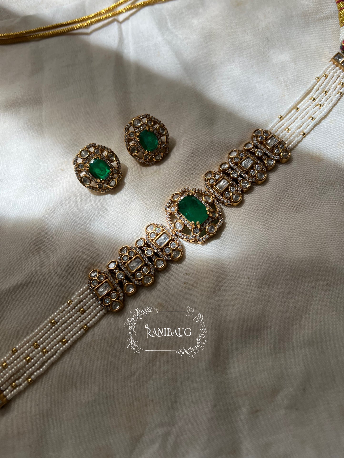Nishi Royal Polki Kundan Studded Gold Finish Layered Necklace Set With Earrings By Ranibaug