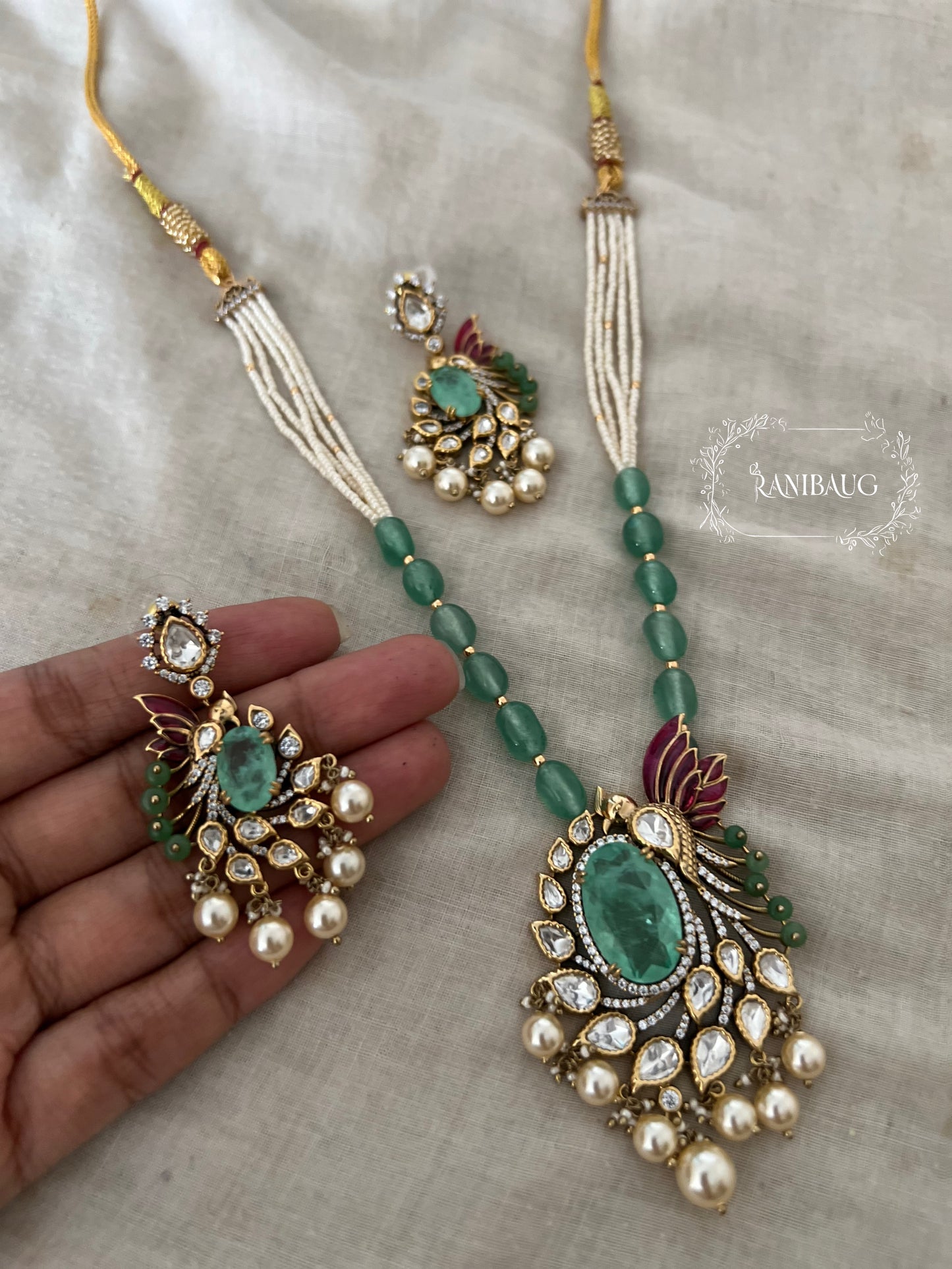 Aaradhya Mint Stone Polki Studded Beaded Pearl Jewellery Set By Ranibaug