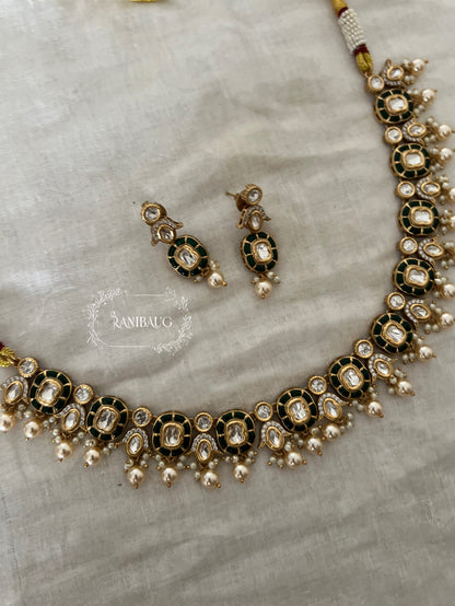 Aarika Polki Studded Rich Gold Finish Pearl Adorned Royal Necklace Jewellery Set By Ranibaug