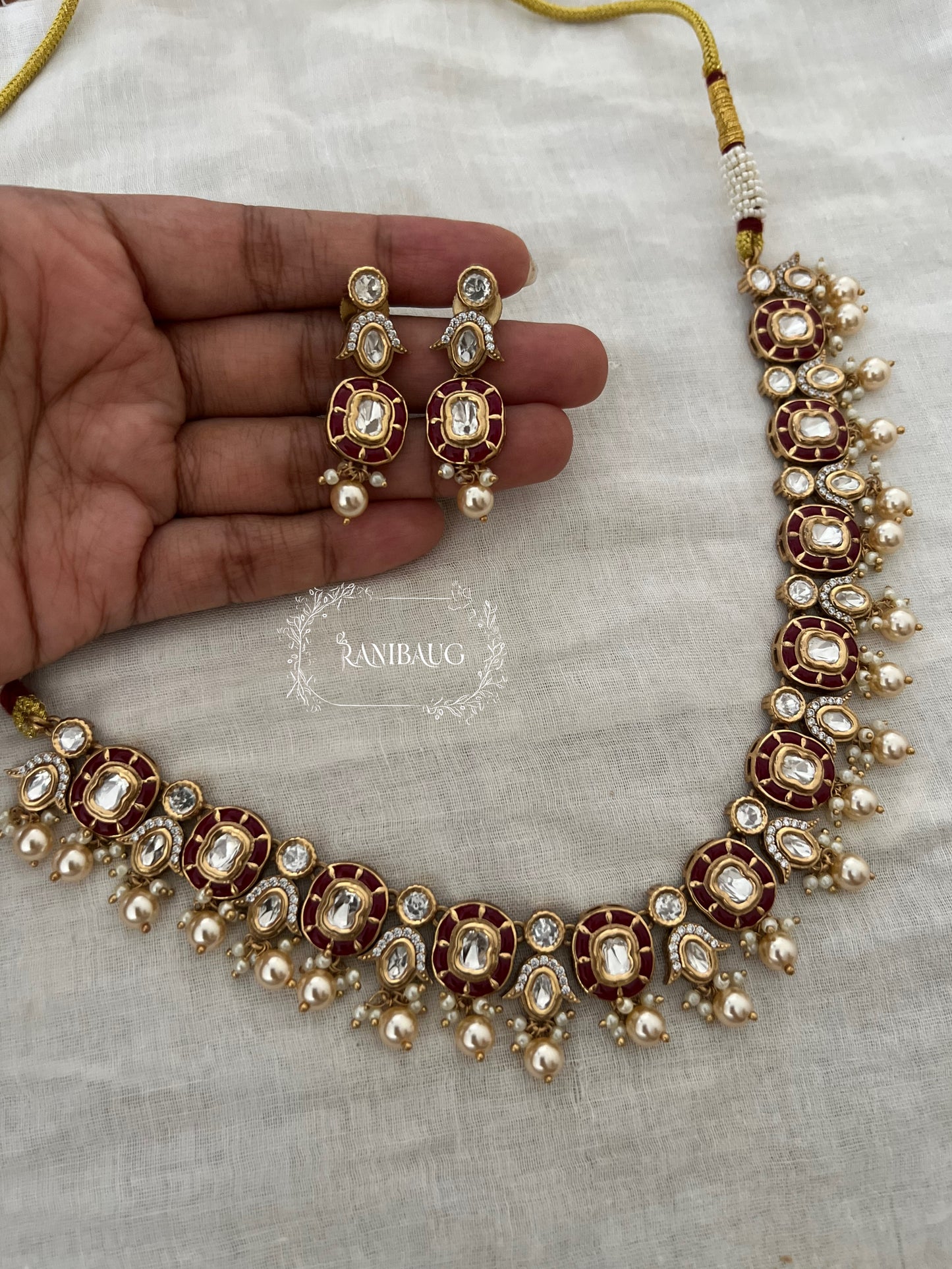 Aarika Polki Studded Rich Gold Finish Pearl Adorned Royal Necklace Jewellery Set By Ranibaug