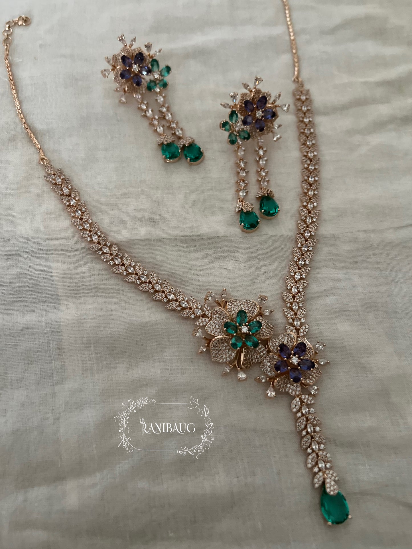 Aarvi Designer Floral Motif Drop Silhouette Premium Finish Diamond Necklace Jewellery Set By Ranibaug