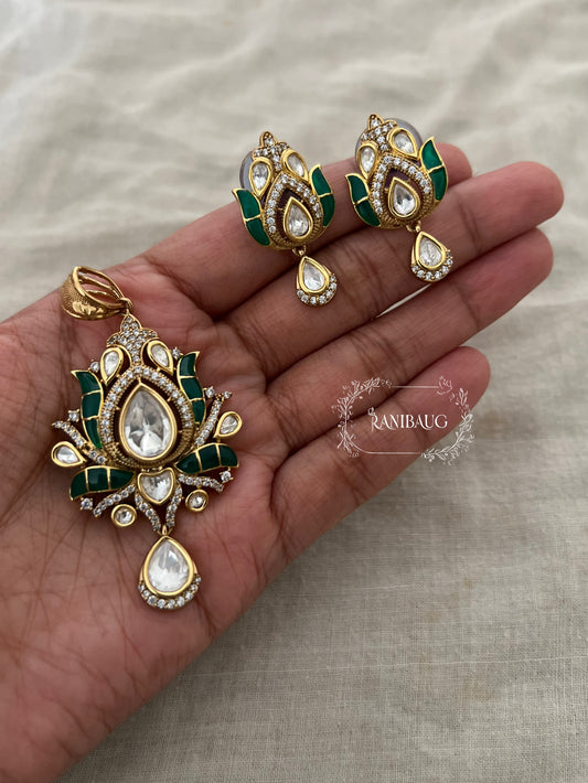 Aarya Polki Drop Tulip Floral Motif In Rich Gold Finish And Emerald Green Enamel Work By Ranibaug