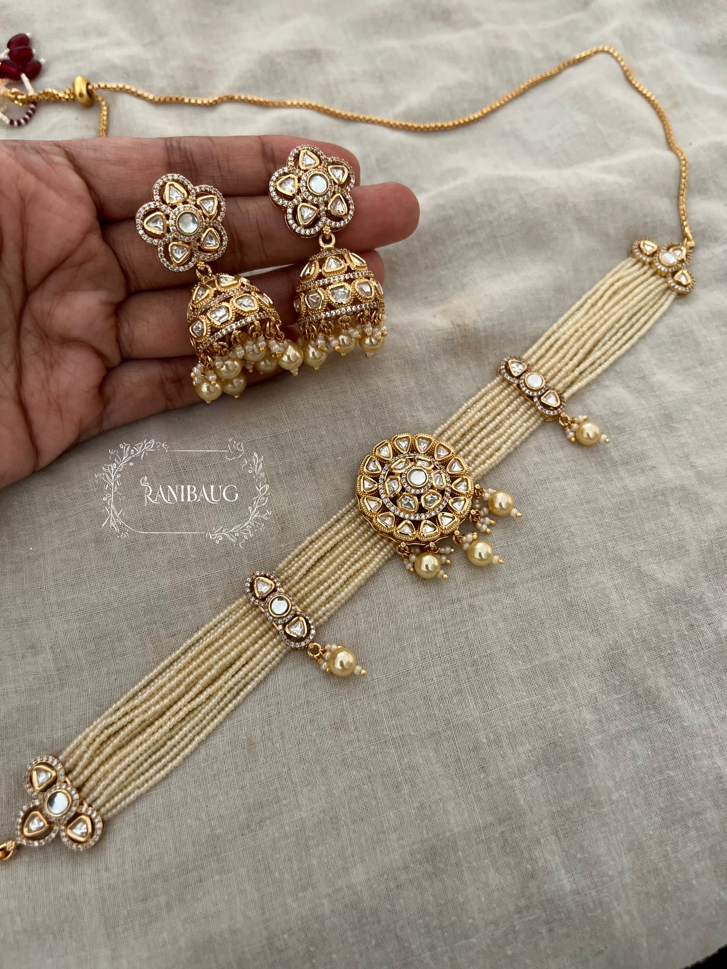 Aastha Gold Pearl Strand Kundan Studded Traditional Choker Set By Ranibaug