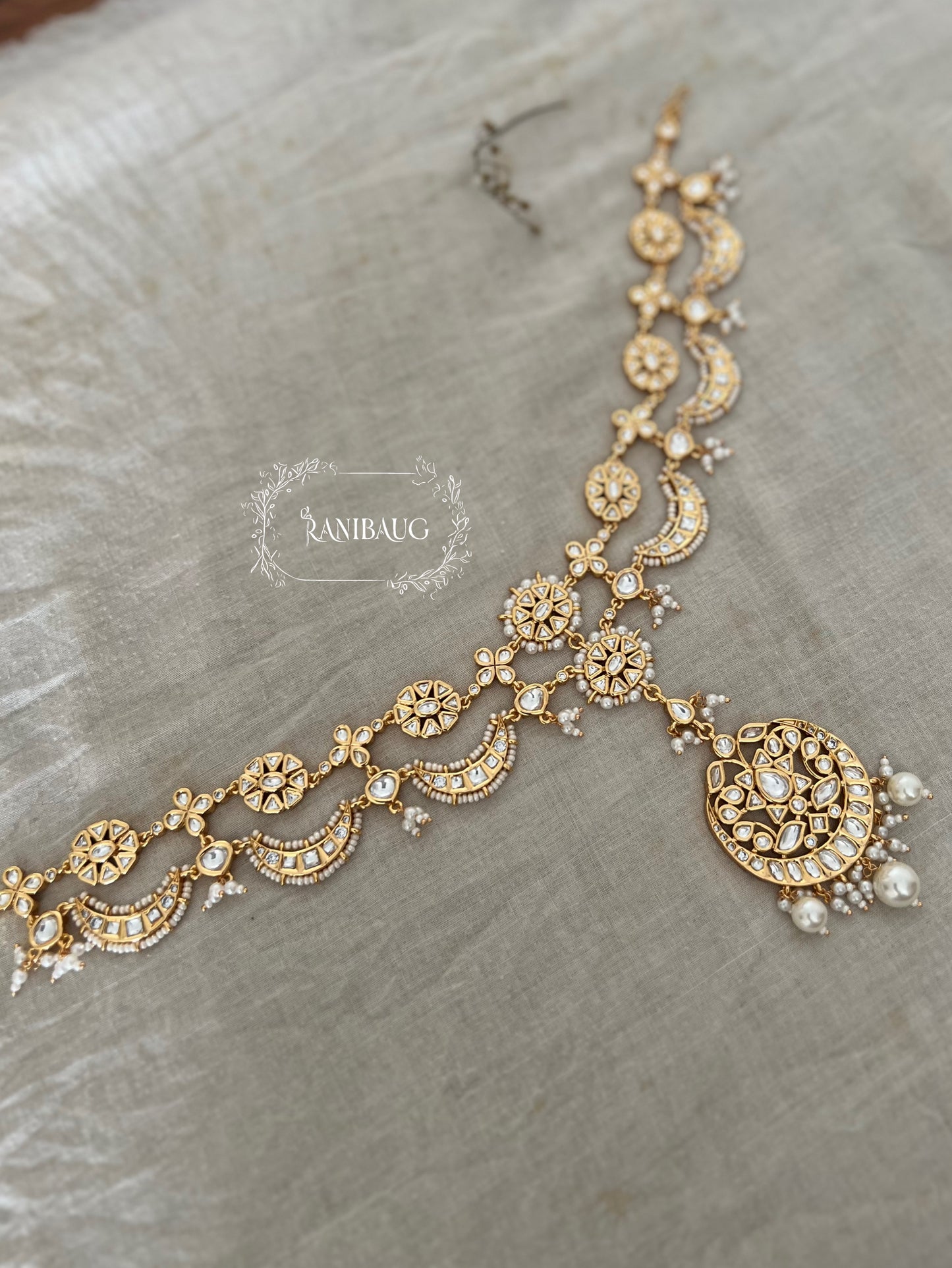 Alka Gold Plated Kundan Studded Sheesh Phool Mang Tika With Pearls By Ranibaug