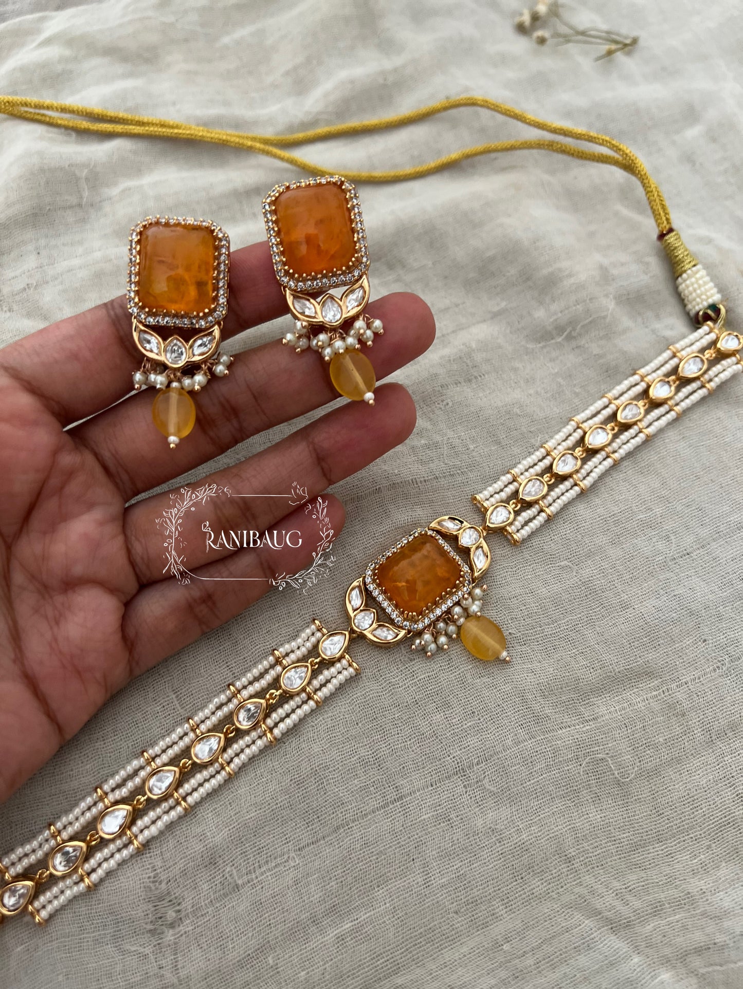 Amara Gemstone Centered Pearl Choker Set By Ranibaug