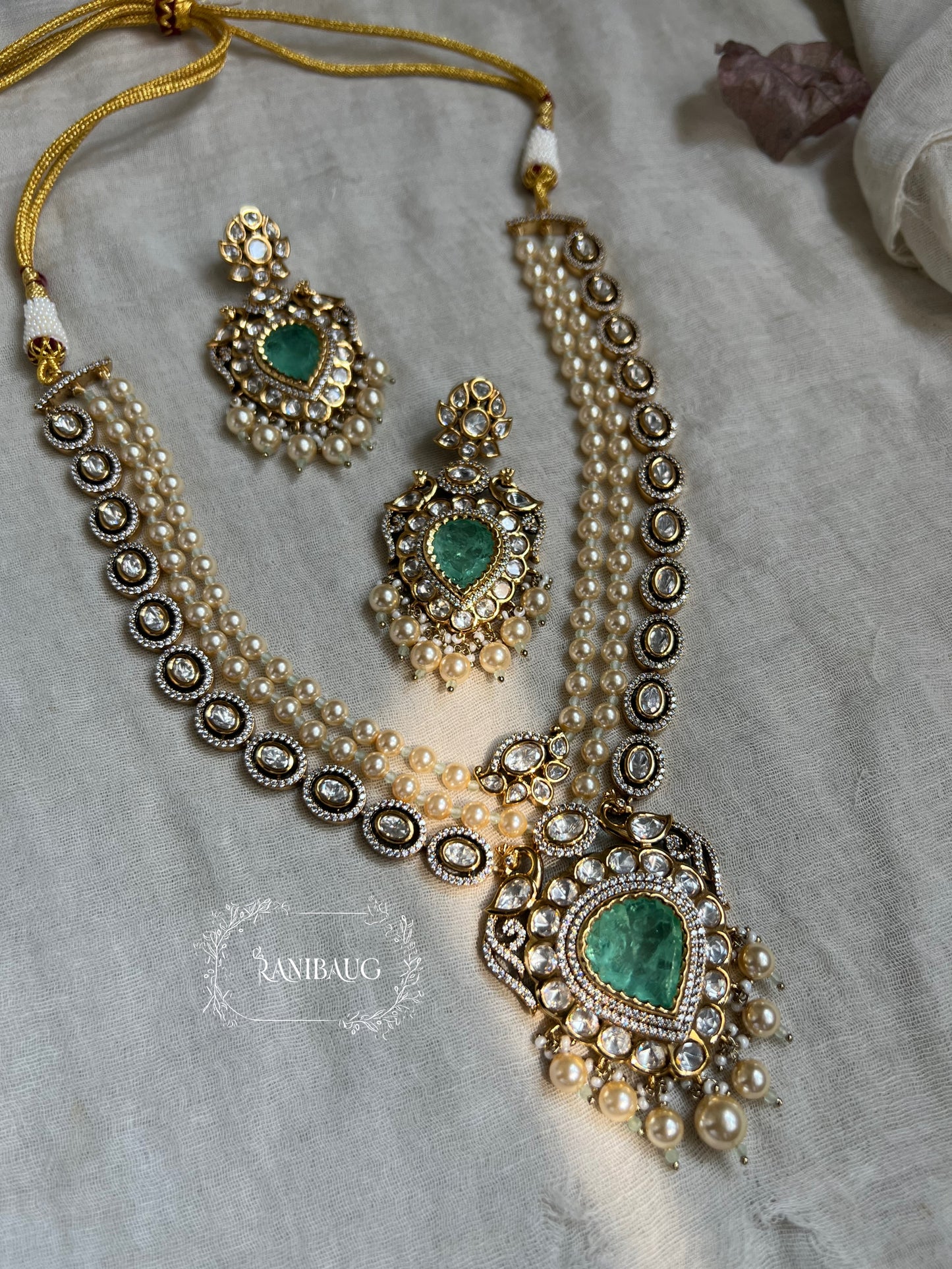 Amara Royal Gold Finish Mossainite Polki Studded Creamy Pearls Adorned Vintage Necklace Jewelry Set By Ranibaug