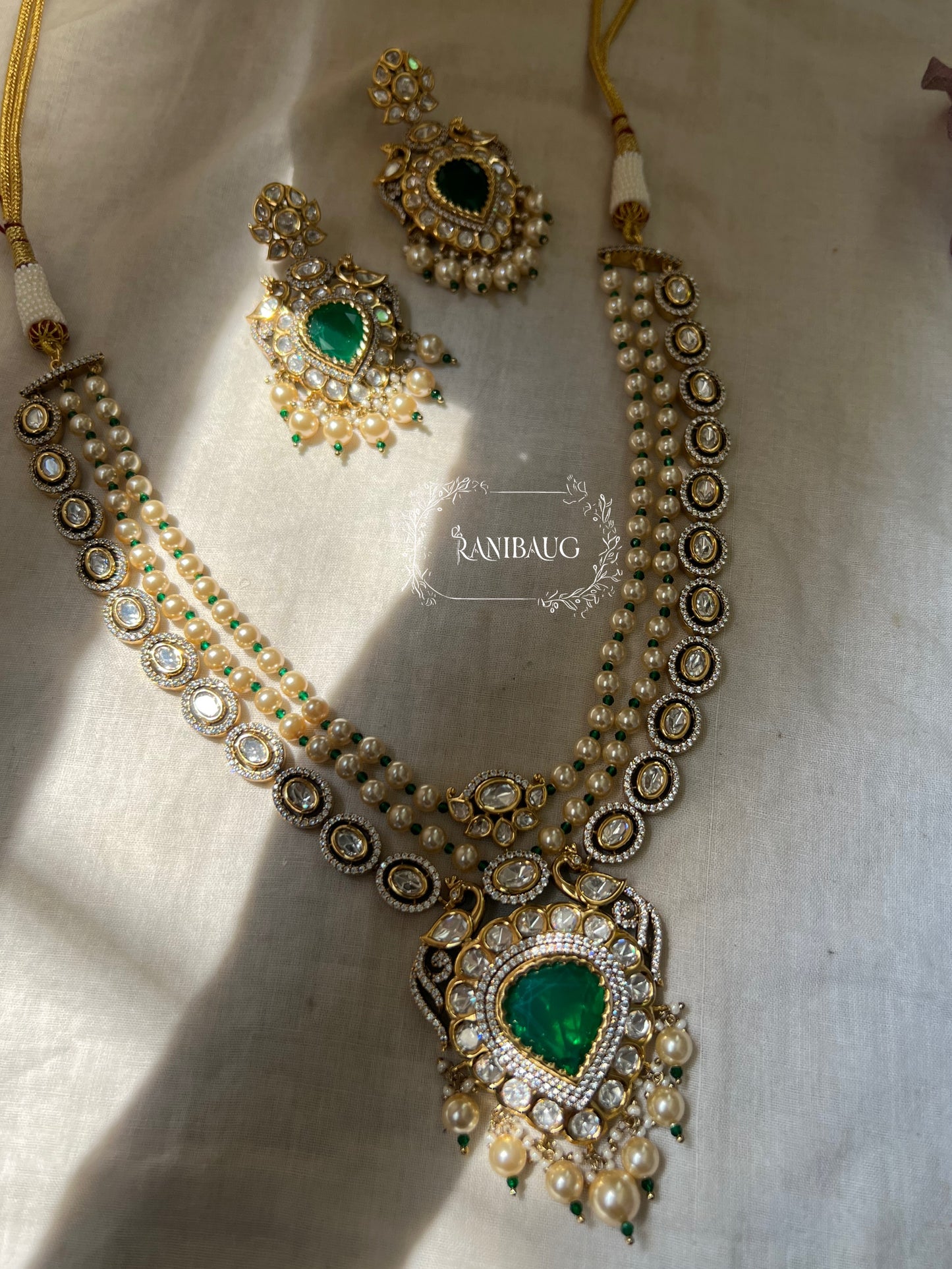 Amara Royal Gold Finish Mossainite Polki Studded Creamy Pearls Adorned Vintage Necklace Jewelry Set By Ranibaug