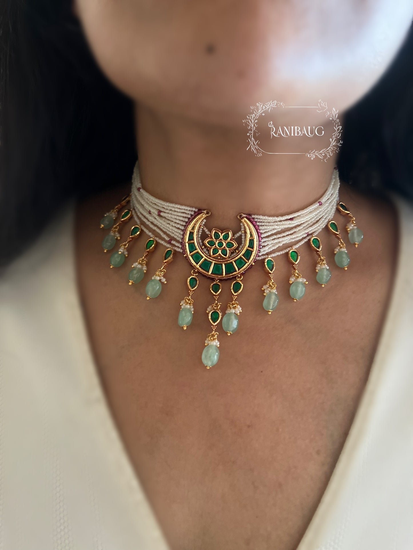 Amayra Moon Crescent Chand Motif Inspired Pastel Mint Stone Drops Gold Finish Choker Set By Ranibaug