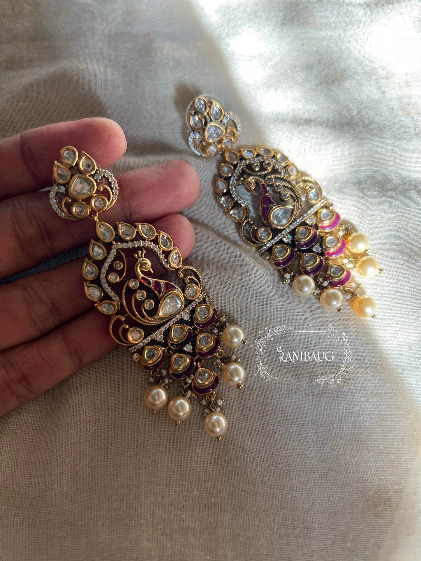 Amisha Antique Gold Victorian Finish Statement Peacock Polki Dangler Earrings With Pearl Fringe By Ranibaug | 2026 Festive Earrings Collection