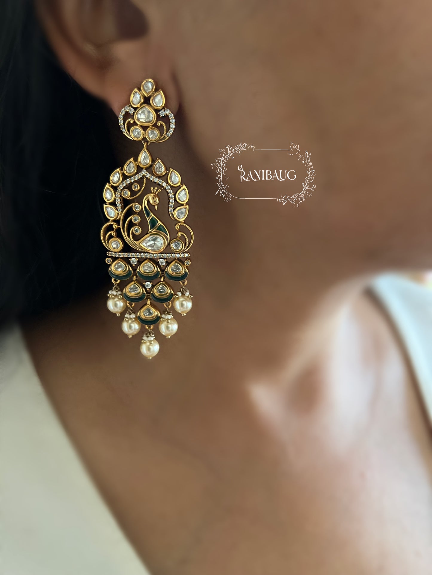 Amisha Antique Gold Victorian Finish Statement Peacock Polki Dangler Earrings With Pearl Fringe By Ranibaug | 2026 Festive Earrings Collection