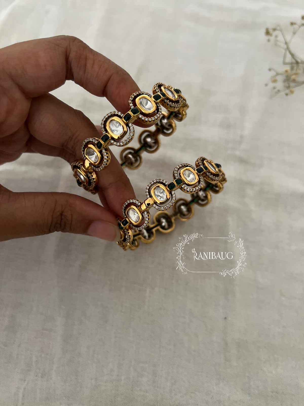 Anara Polki Gold Finish Oval Kundan Motif Designer Bangle By Ranibaug