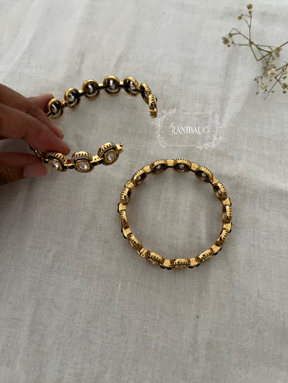 Anara Polki Gold Finish Oval Kundan Motif Designer Bangle By Ranibaug