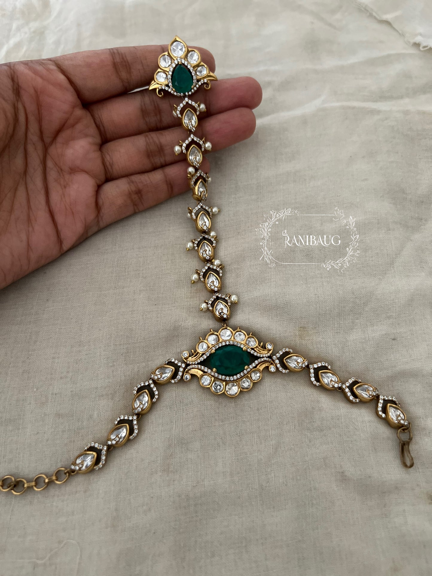 Aranya Gold Finish Polki Studded Colored Stone Haathphool By Ranibaug