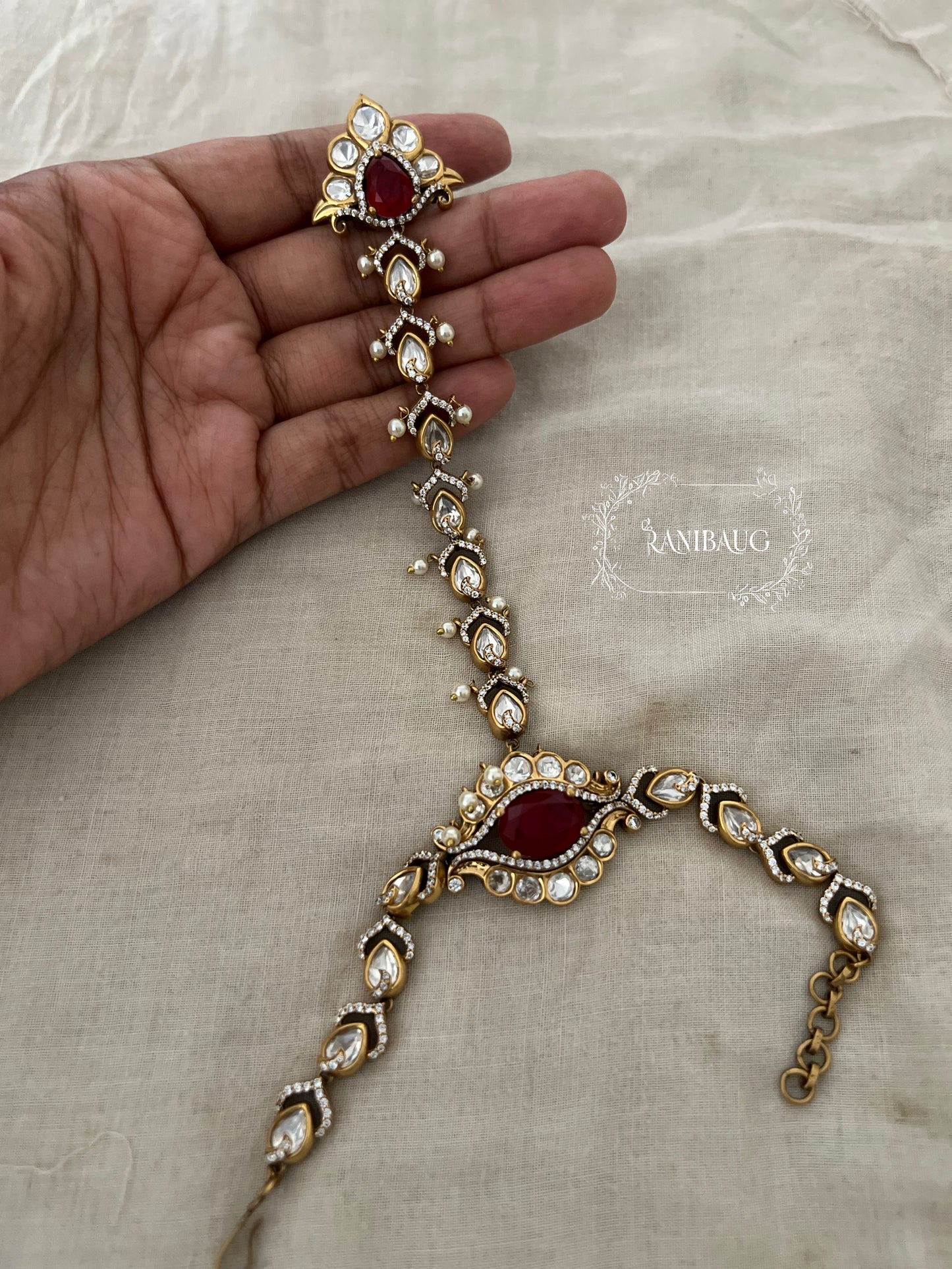 Aranya Gold Finish Polki Studded Colored Stone Haathphool By Ranibaug